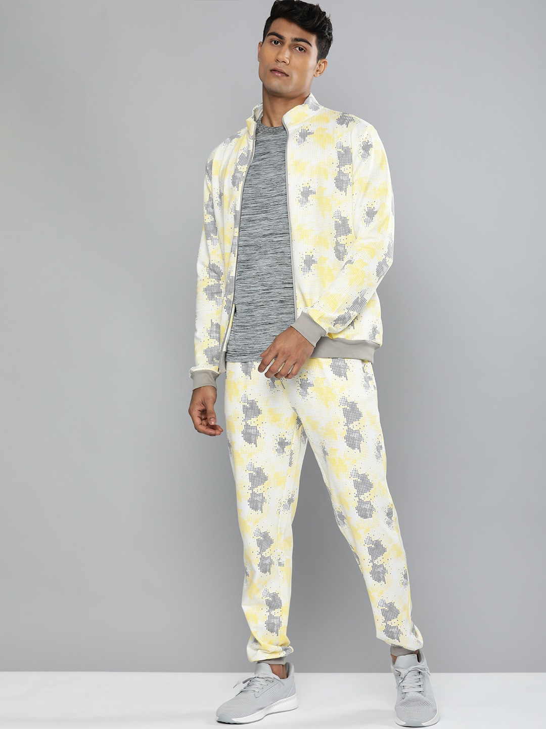 Clothing Tracksuits | HRX By Hrithik Roshan Lifestyle Men Off White & Yellow Bio-Wash AOP Tracksuits - RZ66365