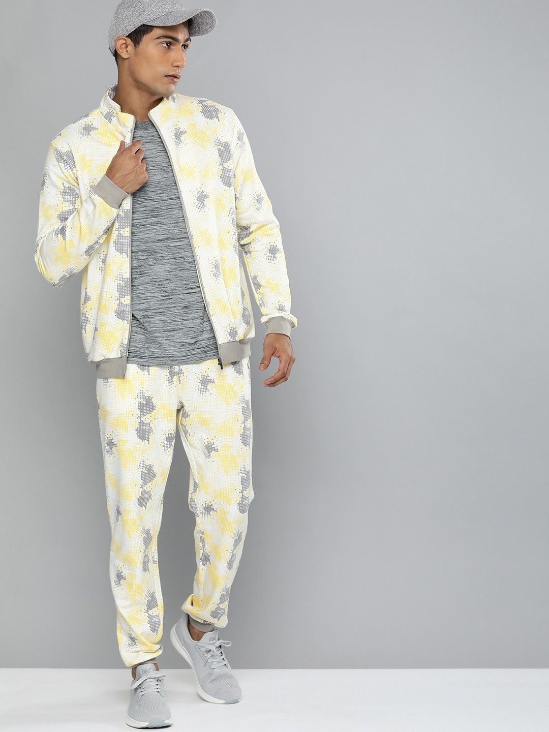 Clothing Tracksuits | HRX By Hrithik Roshan Lifestyle Men Off White & Yellow Bio-Wash AOP Tracksuits - RZ66365