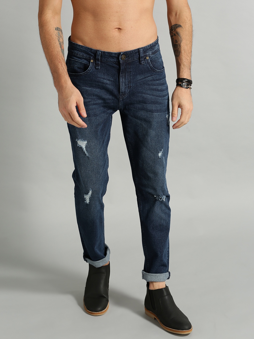 The Roadster Lifestyle Co Men Navy Blue Tapered Fit Mid-Rise Mildly Distressed Stretchable Jeans
The Roadster Lifestyle Co Men Navy Blue Tapered Fit Mid-Rise Mildly Distressed Stretchable Jeans