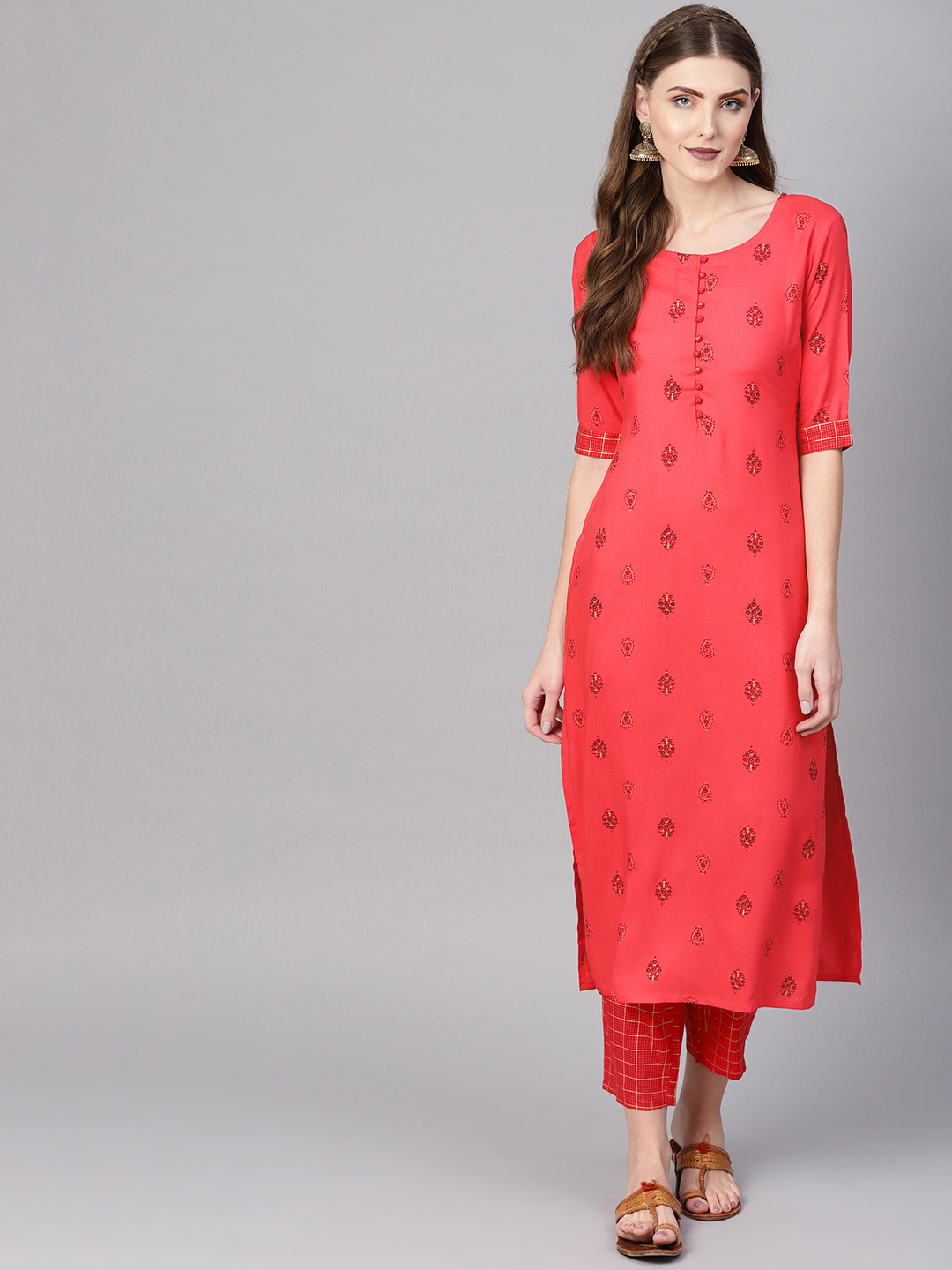 Gerua By Libas Women Coral Red Printed Kurta with Trousers 
Gerua By Libas Women Coral Red Printed Kurta with Trousers