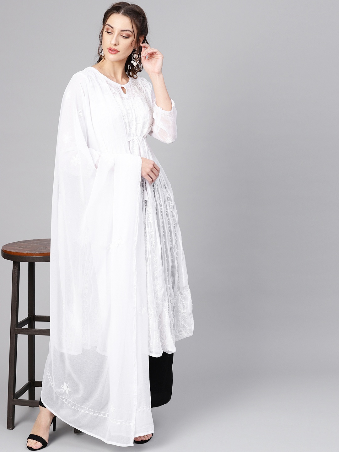 Saadgi Women White Aari Embroidered Handloom Sheer Anarkali Kurta With Dupatta
Saadgi Women White Aari Embroidered Handloom Sheer Anarkali Kurta With Dupatta