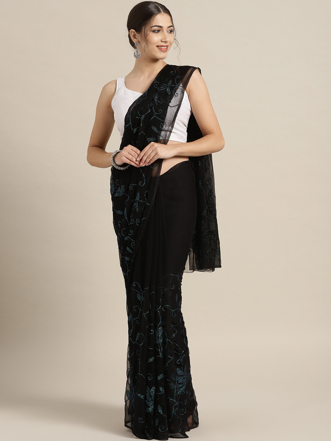 Geroo Jaipur Hand Embroidered Black Sequins Jaal Pure Chiffon Sustainable Saree
Geroo Jaipur Hand Embroidered Black Sequins Jaal Pure Chiffon Sustainable Saree