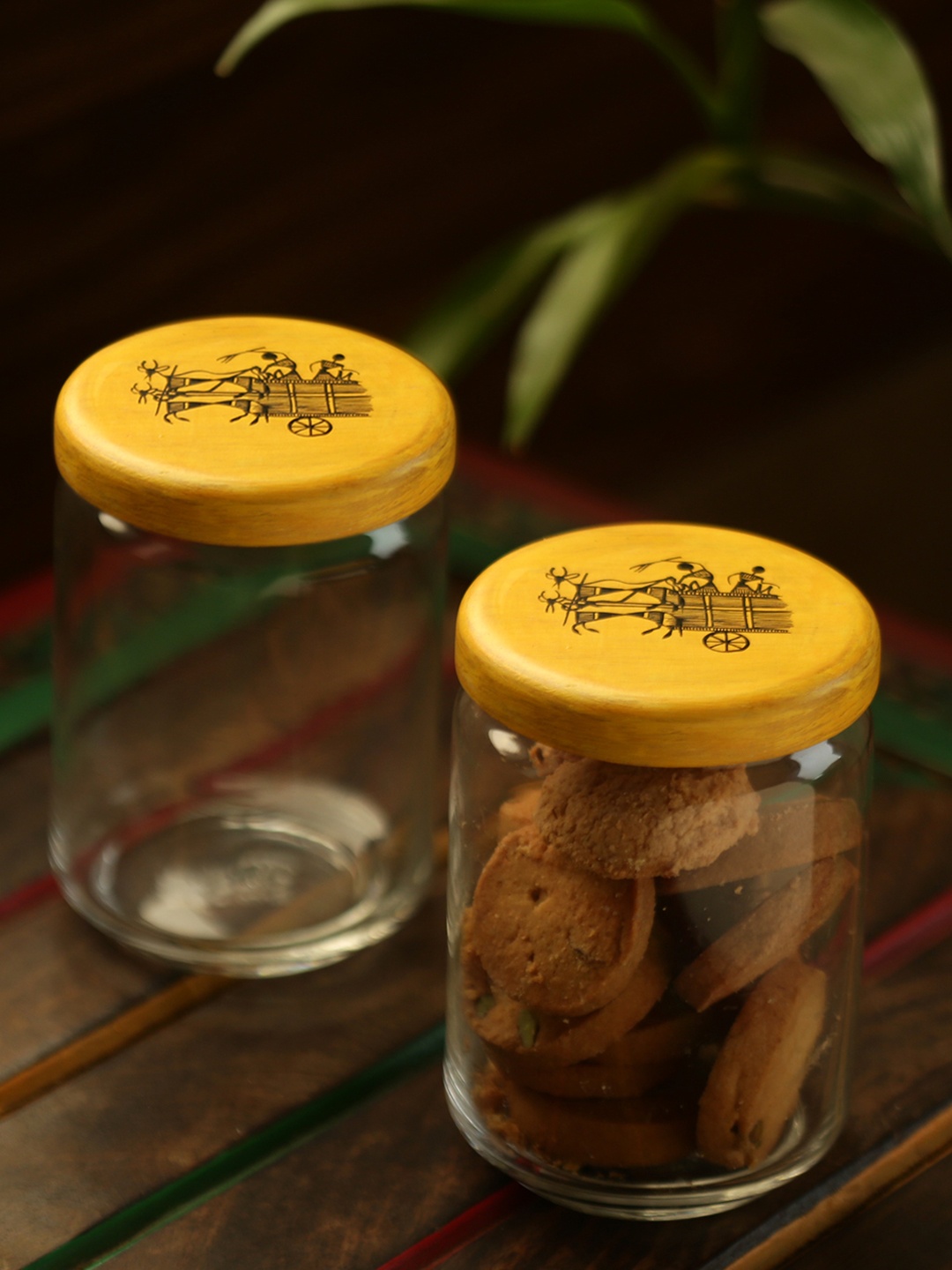 ExclusiveLane Set Of 2 Duals Of Warli Hand-Painted Glass Wood Snacks Cookies Jar, Yellow
ExclusiveLane Set Of 2 Duals Of Warli Hand-Painted Glass Wood Snacks Cookies Jar, Yellow