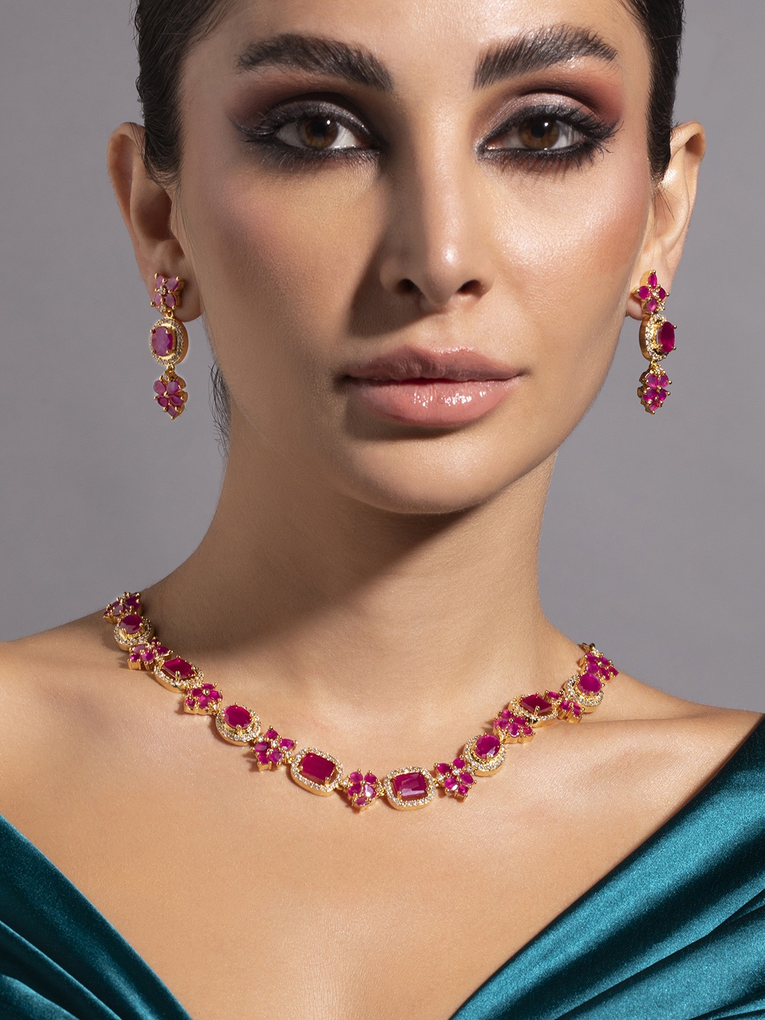 Rubans Women Pink & Gold-Plated Hand-Crafted Emerald Stone Studded Statement Jewellery Set
Rubans Women Pink & Gold-Plated Hand-Crafted Emerald Stone Studded Statement Jewellery Set