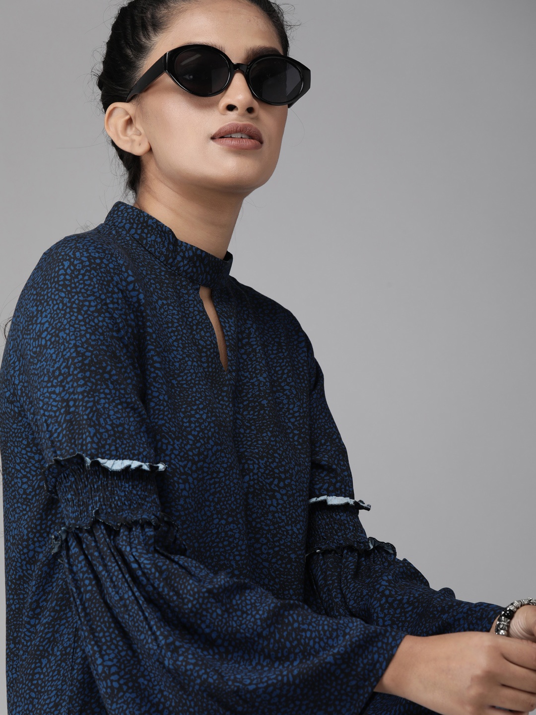 The Roadster Lifestyle Co ECOVERO Greenturn Women Navy Blue Printed Sustainable Top with Smocked Bell Sleeve
The Roadster Lifestyle Co ECOVERO Greenturn Women Navy Blue Printed Sustainable Top with Smocked Bell Sleeve