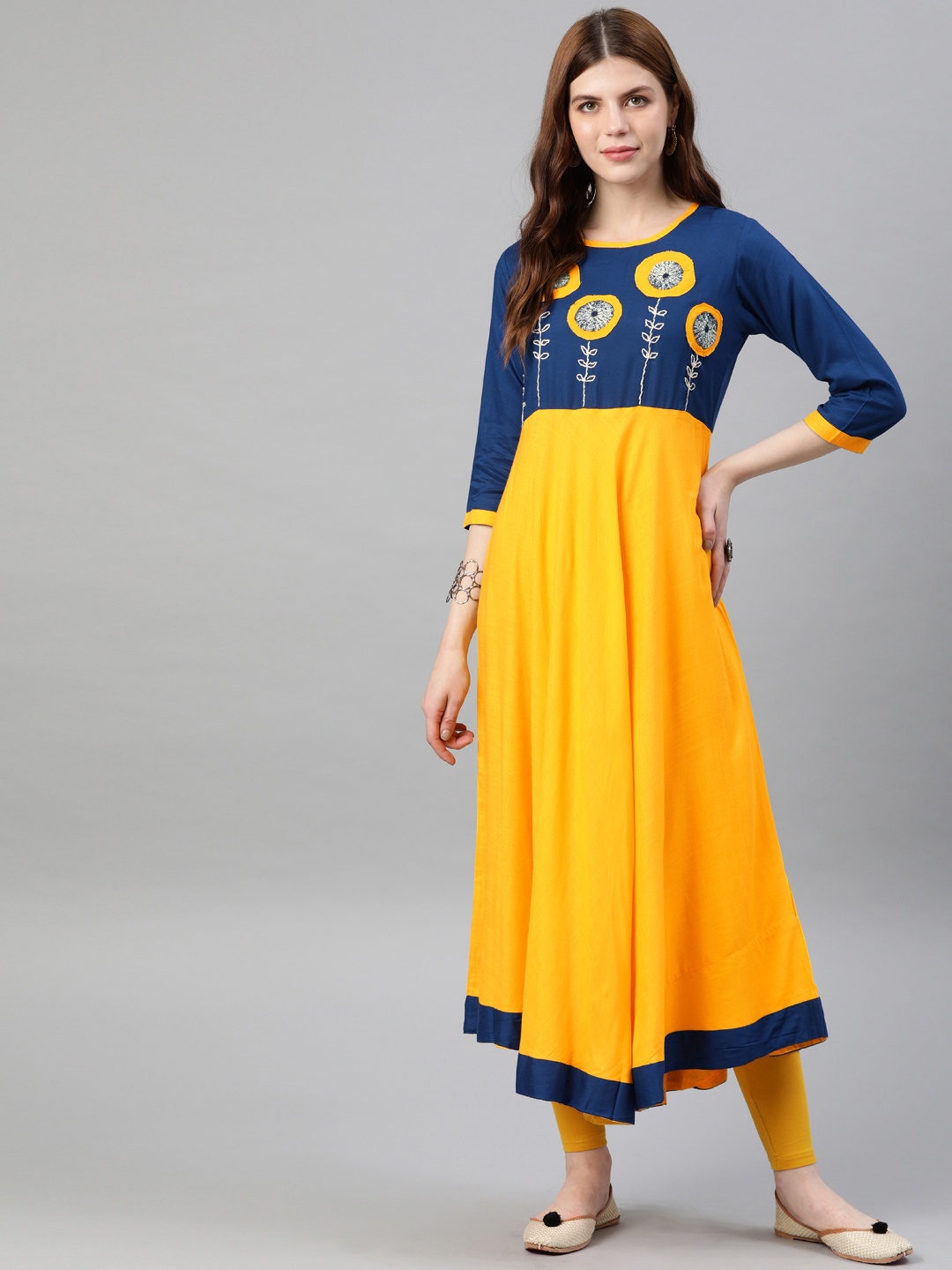 YASH GALLERY Women Mustard Yoke Design Asymmetric Anarkali Kurta With Applique Detail
YASH GALLERY Women Mustard Yoke Design Asymmetric Anarkali Kurta With Applique Detail