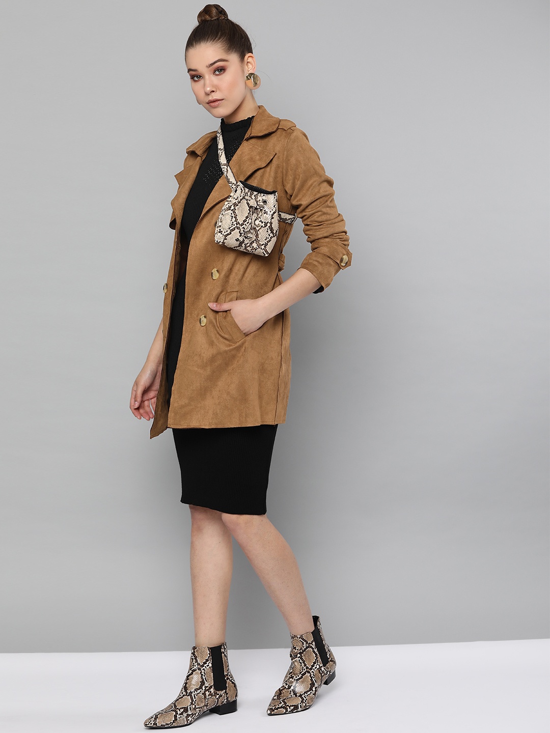 Harpa Women Brown Solid Double-Breasted Regular Length Trench Coat With Suede Finish
Harpa Women Brown Solid Double-Breasted Regular Length Trench Coat With Suede Finish