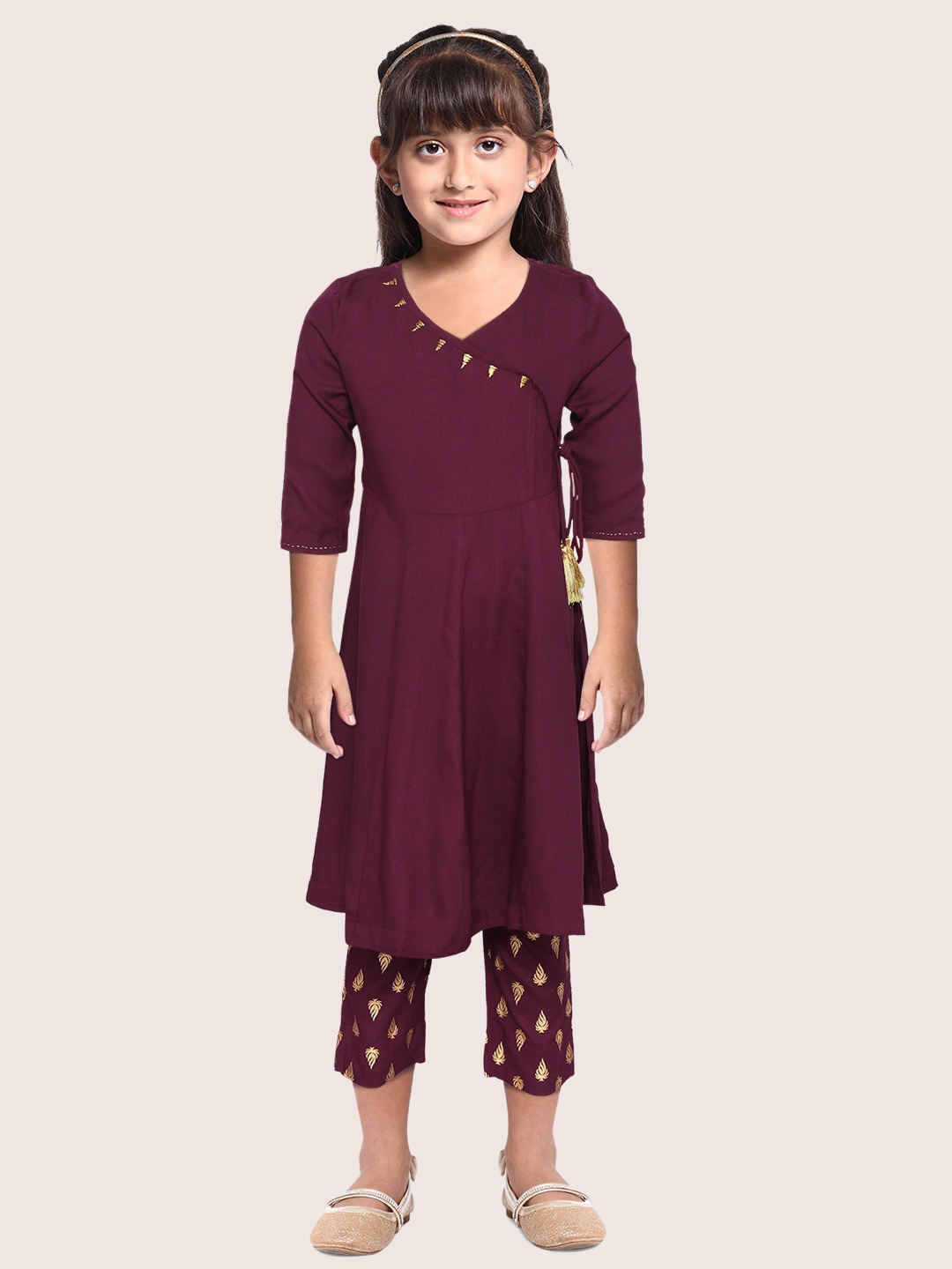 Sangria Girls Wine-Coloured & Golden Solid Angrakha Kurta with Printed Trousers, Burgundy
Sangria Girls Wine-Coloured & Golden Solid Angrakha Kurta with Printed Trousers, Burgundy