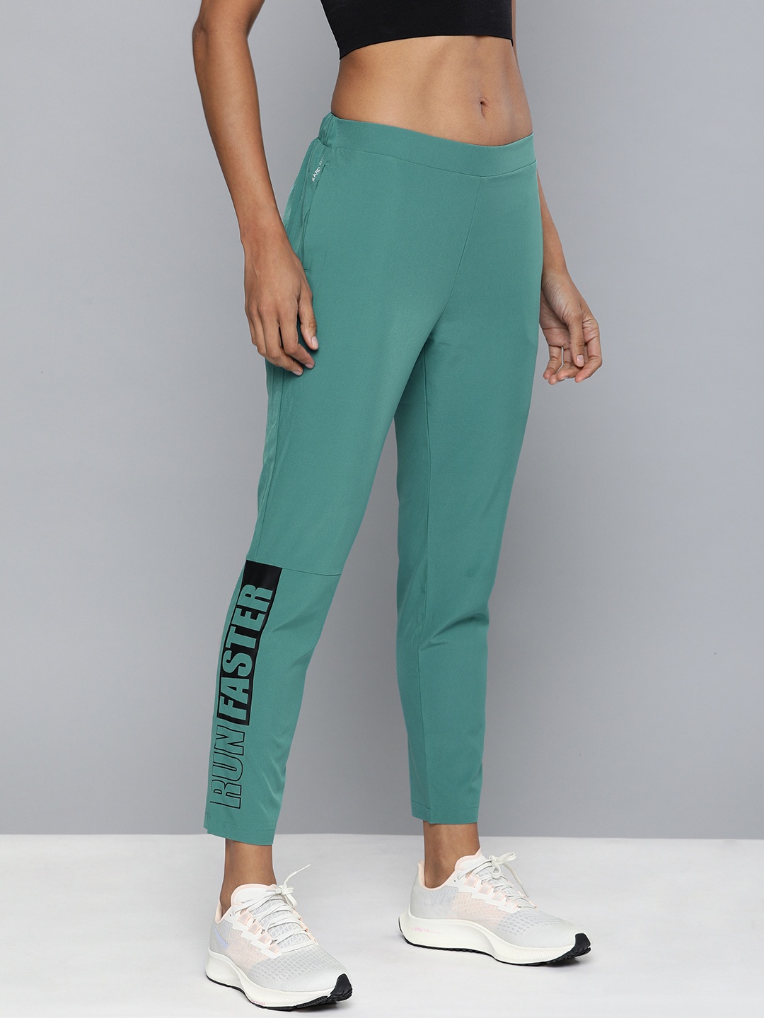 HRX by Hrithik Roshan Women Sea Green Printed Rapid Dry Antimicrobial Running Track Pants
HRX by Hrithik Roshan Women Sea Green Printed Rapid Dry Antimicrobial Running Track Pants