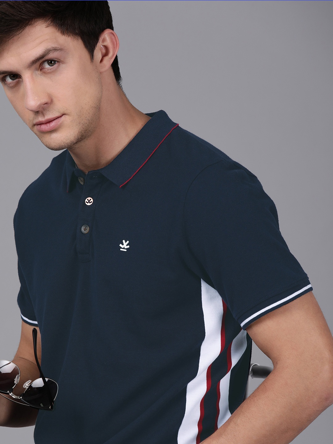 WROGN Men Navy Blue Slim Fit Solid Polo Collar Pure Cotton T-shirt with Printed Detailing
WROGN Men Navy Blue Slim Fit Solid Polo Collar Pure Cotton T-shirt with Printed Detailing