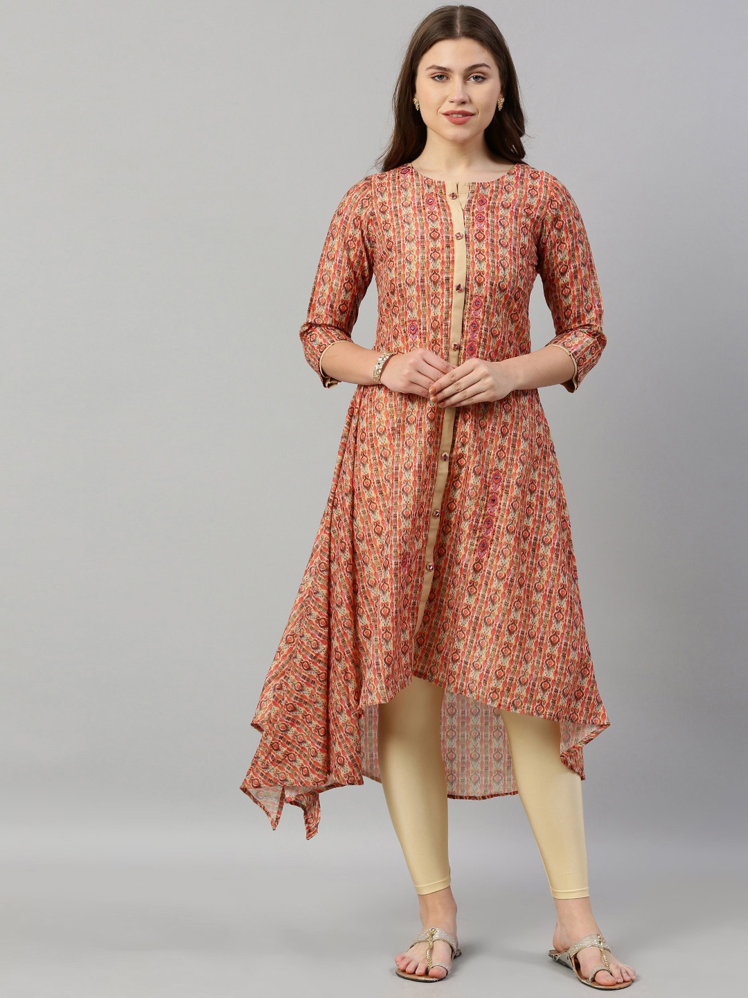 Neerus Women Beige & Orange Printed A-Line Asymmetric Kurta With Embroidery & Mirror Work
Neerus Women Beige & Orange Printed A-Line Asymmetric Kurta With Embroidery & Mirror Work