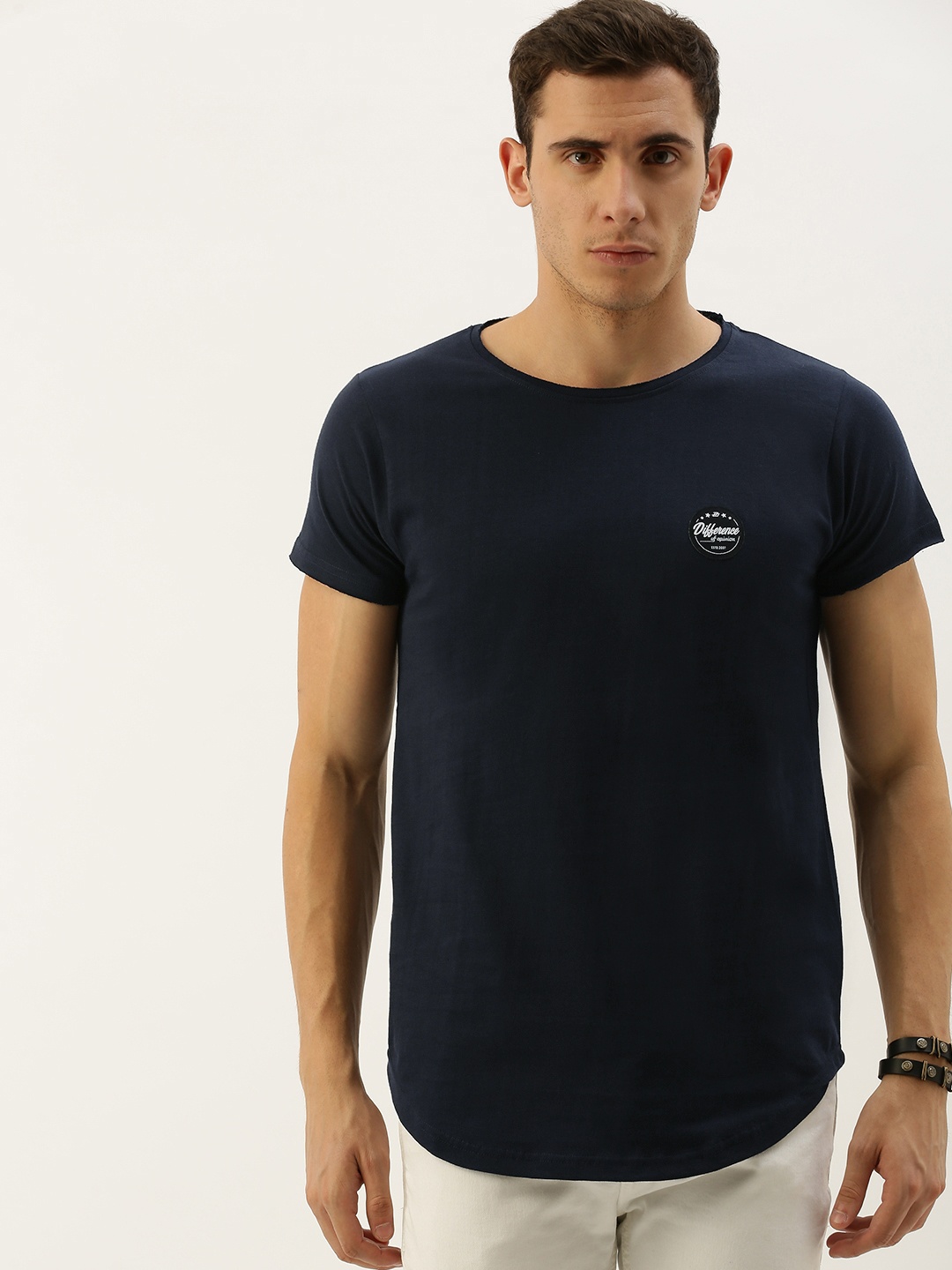 Difference of Opinion Men Navy Blue Solid Round Neck Pure Cotton T-shirt with Applique Detail
Difference of Opinion Men Navy Blue Solid Round Neck Pure Cotton T-shirt with Applique Detail