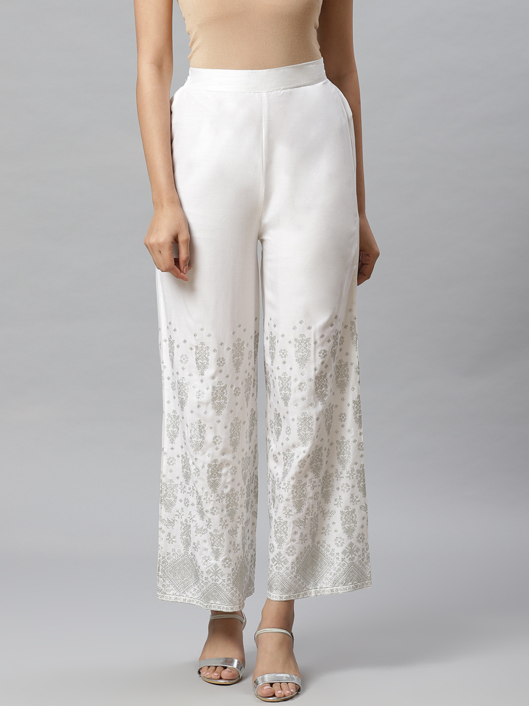 AURELIA Women White & Silver Printed Straight Palazzos
AURELIA Women White & Silver Printed Straight Palazzos