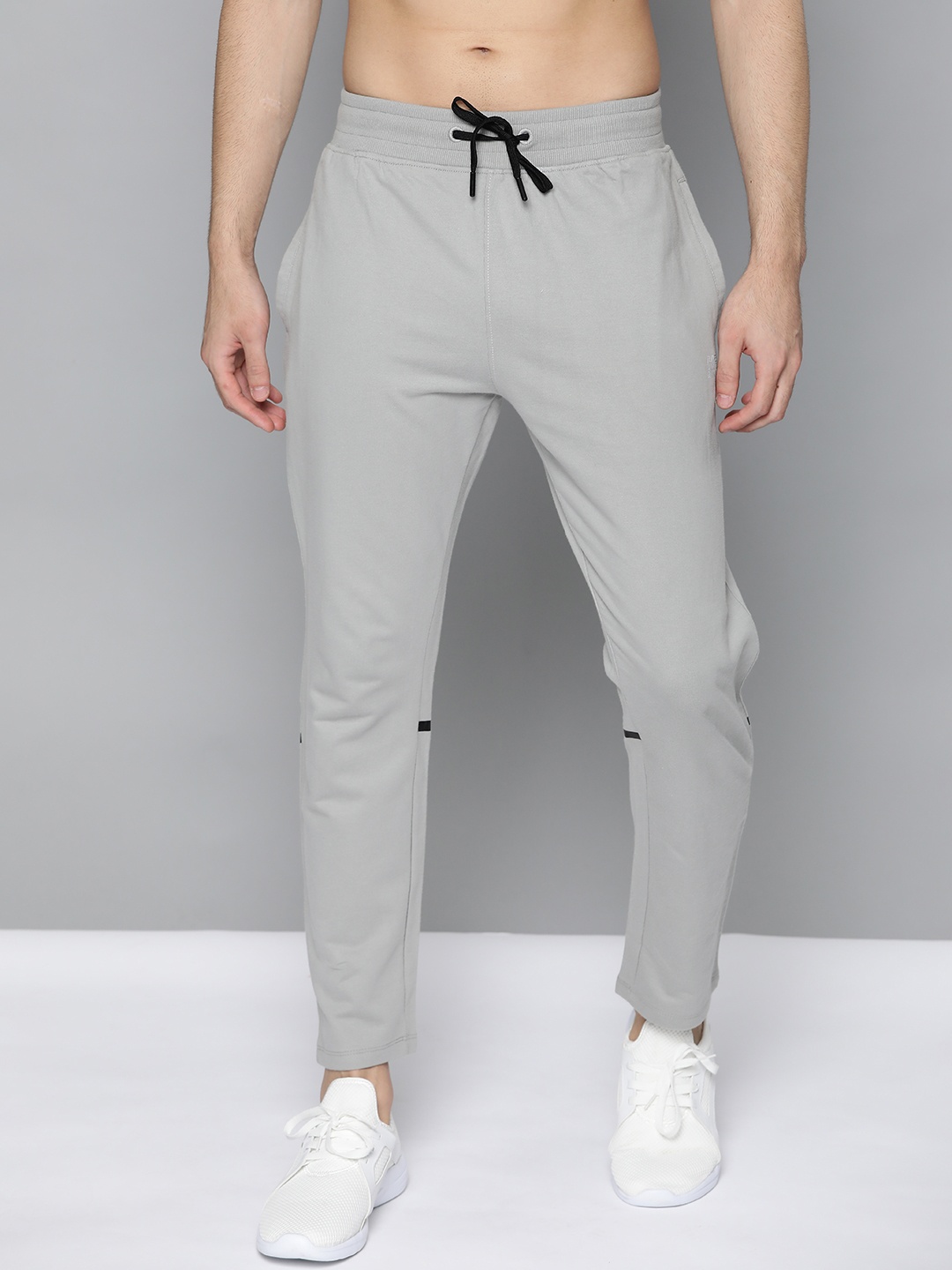 HRX by Hrithik Roshan Men Wet weather Solid Slim fit Bio-Wash Running Track Pants, Grey
HRX by Hrithik Roshan Men Wet weather Solid Slim fit Bio-Wash Running Track Pants, Grey