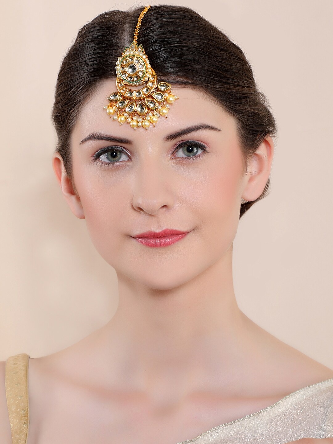 Rubans 22K Gold-Plated & White Stone-Studded Handcrafted Traditional Maang Tikka
Rubans 22K Gold-Plated & White Stone-Studded Handcrafted Traditional Maang Tikka