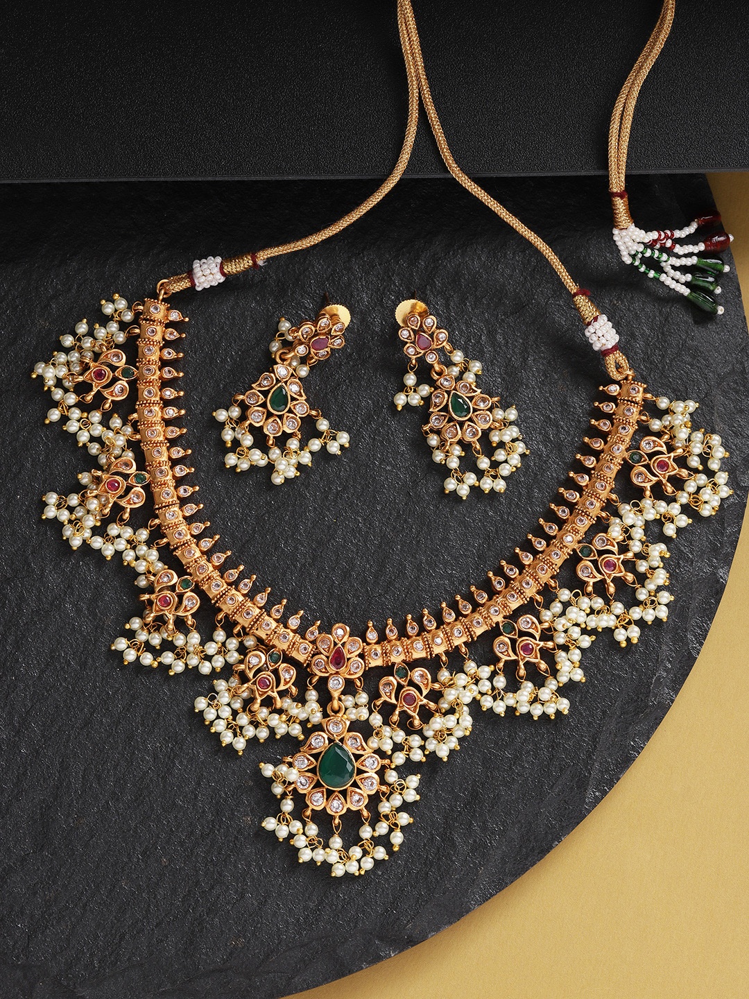 Priyaasi Green & Off-White Gold-Plated Stone Studded & Beaded Handcrafted Jewellery Set
Priyaasi Green & Off-White Gold-Plated Stone Studded & Beaded Handcrafted Jewellery Set