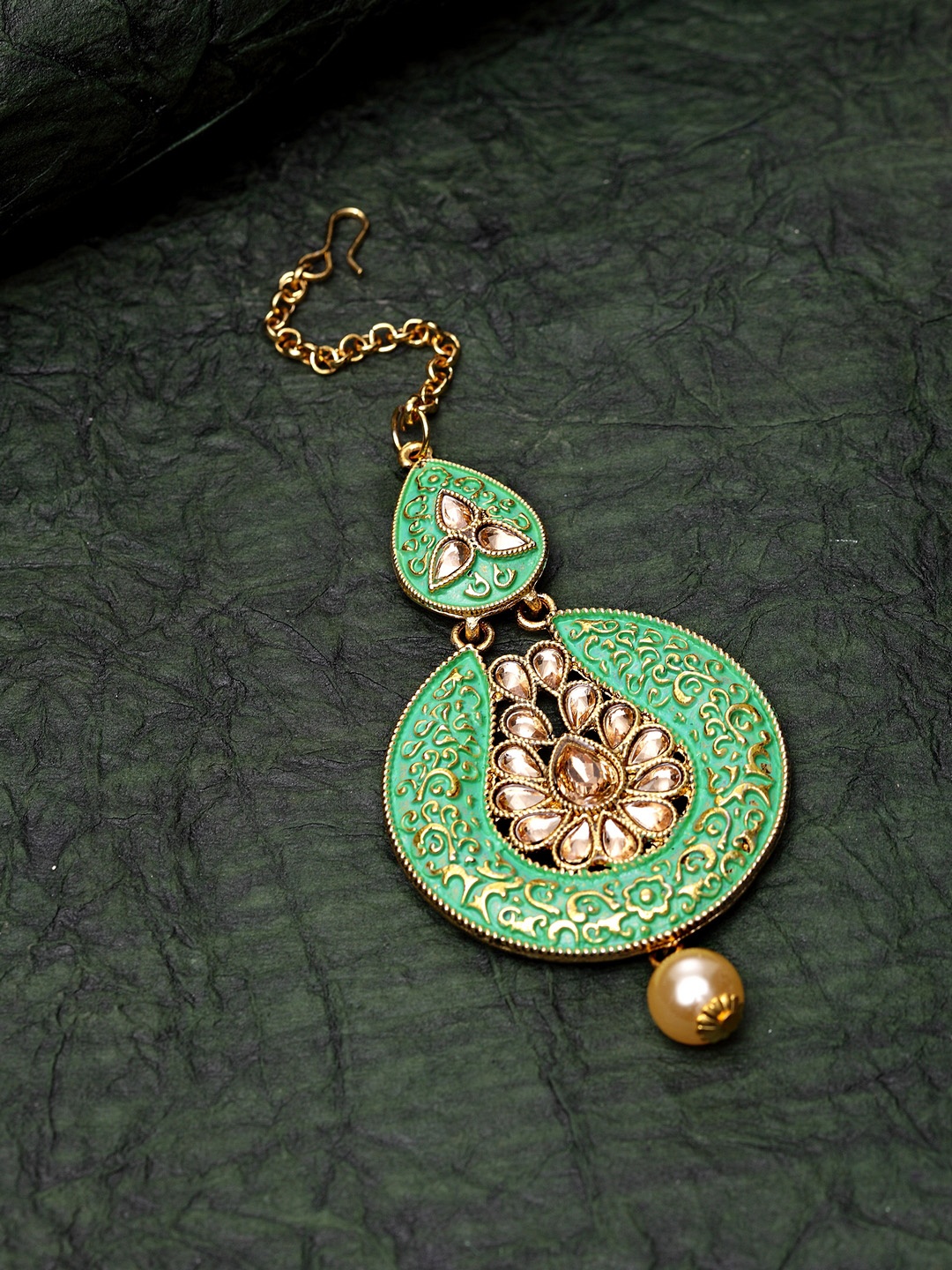 ANIKAS CREATION Gold-Plated & Green Stone Studded Enameled Hand Painted Traditional Maang Tikka
ANIKAS CREATION Gold-Plated & Green Stone Studded Enameled Hand Painted Traditional Maang Tikka
