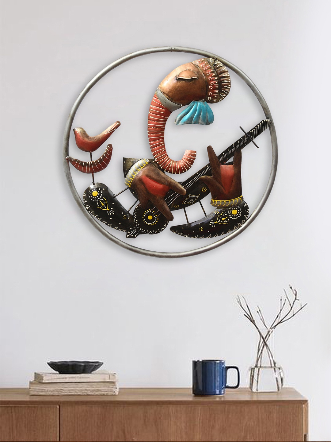 eCraftIndia Brown & Black Handcrafted Lord Ganesha Playing The Instrument Wall Hanging
eCraftIndia Brown & Black Handcrafted Lord Ganesha Playing The Instrument Wall Hanging