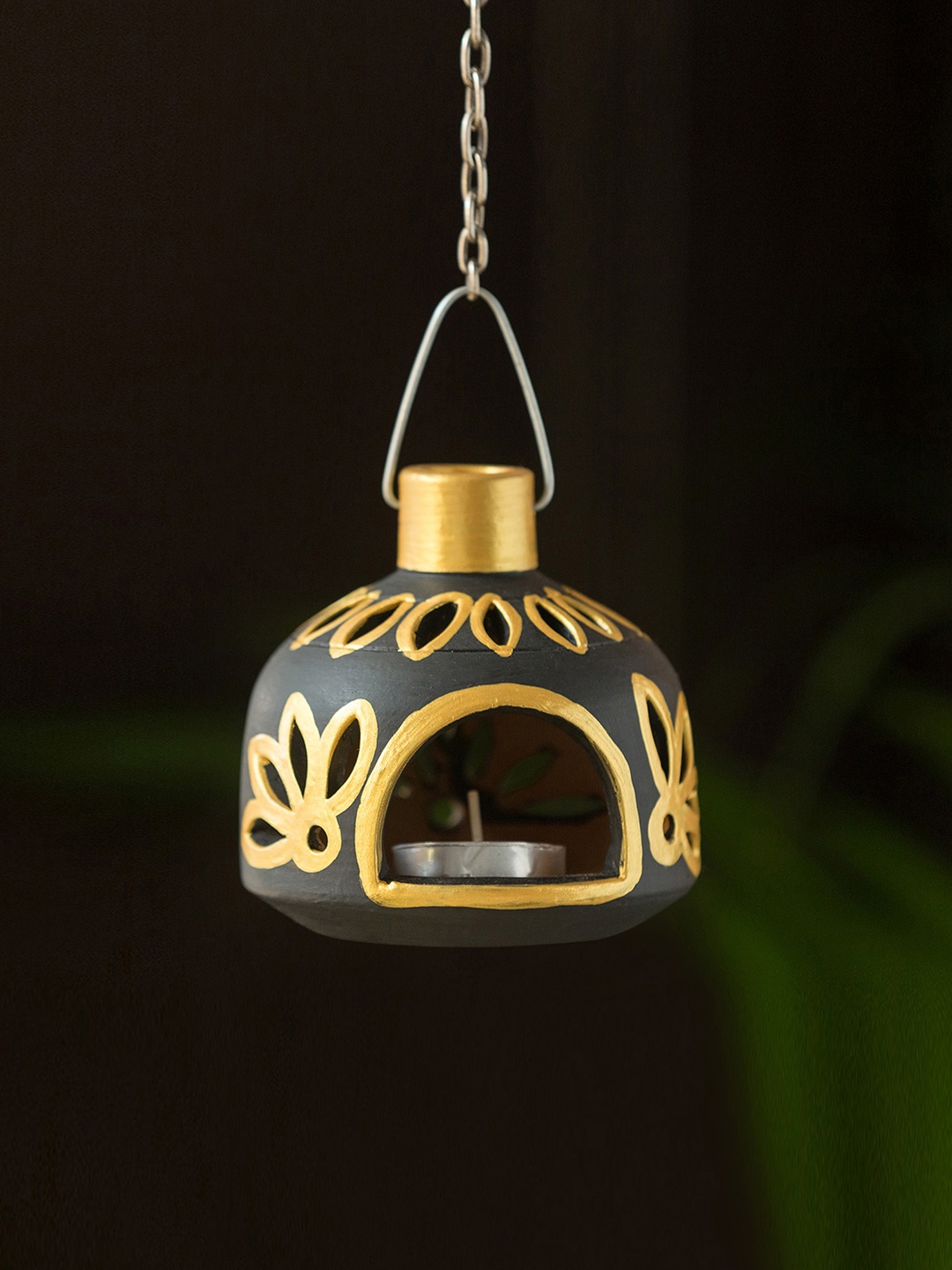 ExclusiveLane Glowing Matki Hand-Painted Hanging Tea Light Candle Holder In Terracotta, Black
ExclusiveLane Glowing Matki Hand-Painted Hanging Tea Light Candle Holder In Terracotta, Black