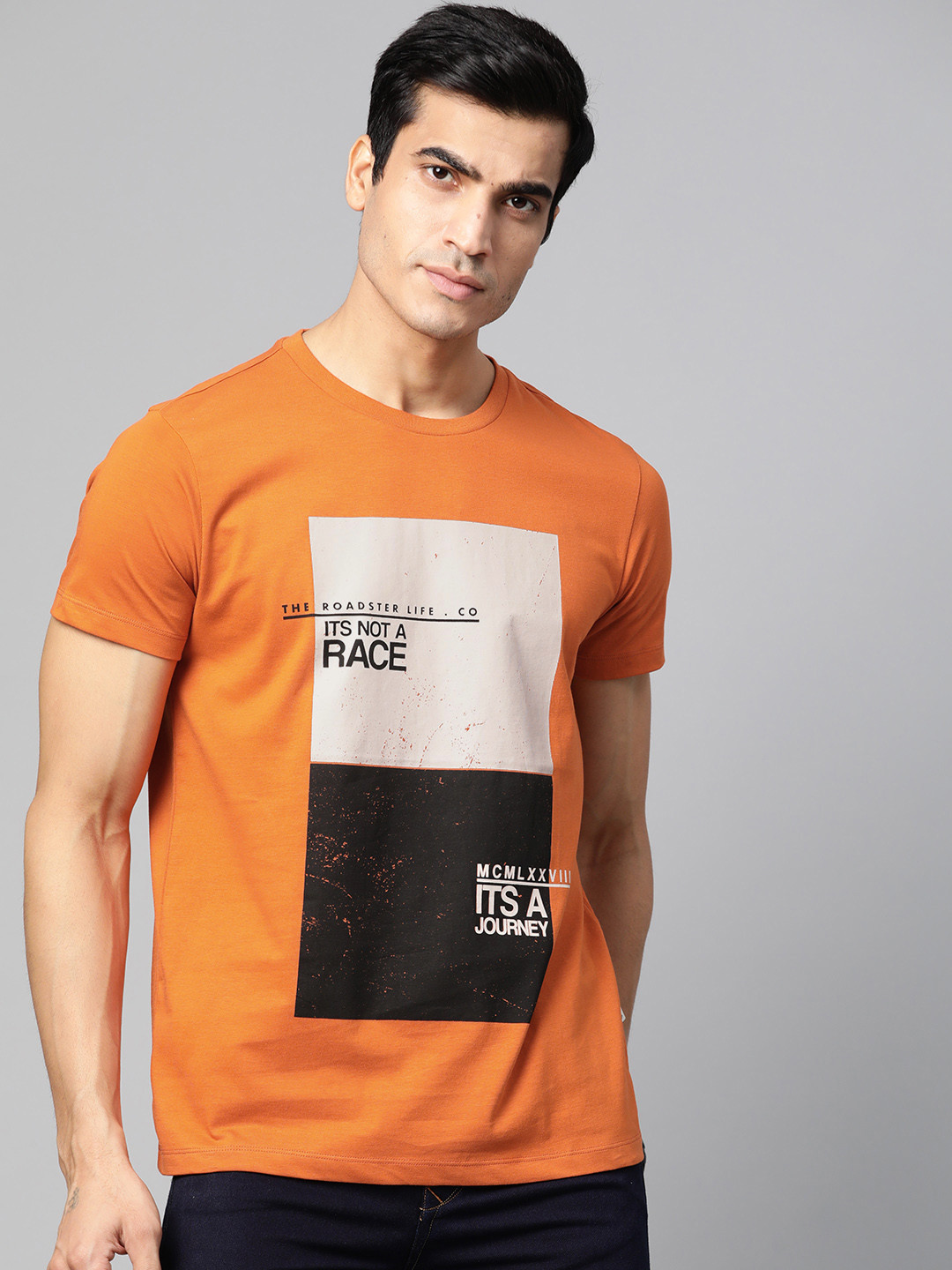 Roadster Men Rust Orange & Black Printed Round Neck T-shirt
Roadster Men Rust Orange & Black Printed Round Neck T-shirt