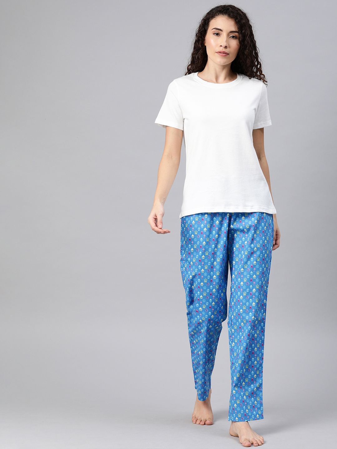 DRAPE IN VOGUE Women White & Blue Solid Night Suit With Conversational Printed Bottomwear
DRAPE IN VOGUE Women White & Blue Solid Night Suit With Conversational Printed Bottomwear