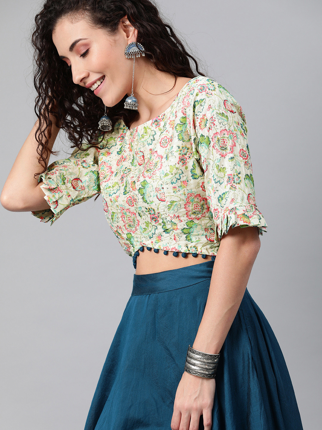 Inddus Teal Blue Solid Ready to Wear Lehenga with Floral Printed & Embroidered Blouse
Inddus Teal Blue Solid Ready to Wear Lehenga with Floral Printed & Embroidered Blouse
