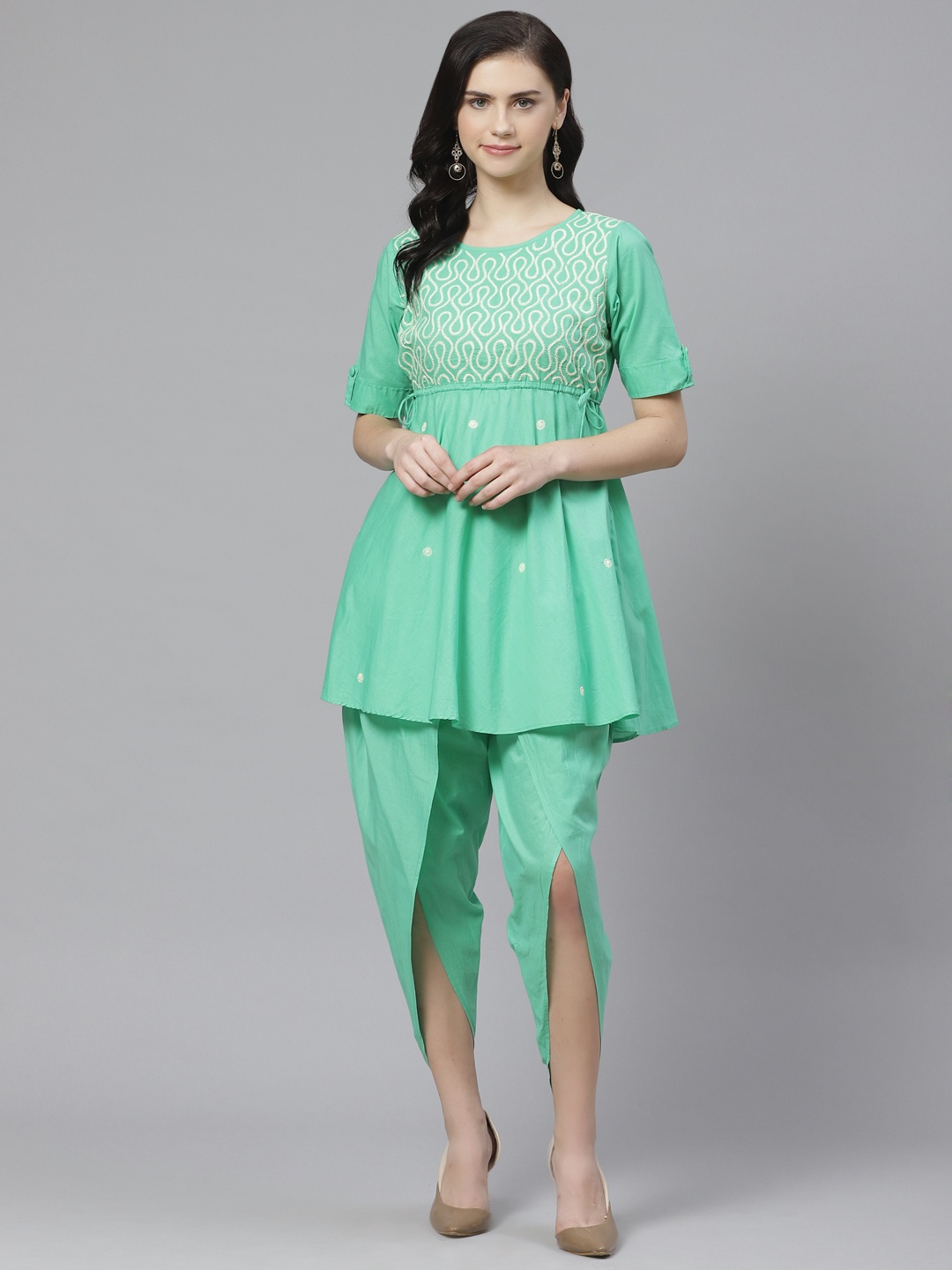 ADA Women Green & Off-White Chikankari Embroidered Sustainable Kurti with Dhoti Pants
ADA Women Green & Off-White Chikankari Embroidered Sustainable Kurti with Dhoti Pants