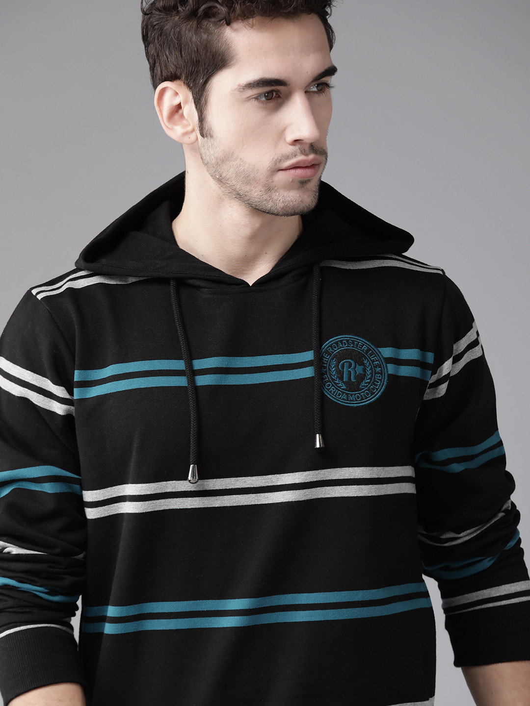 Roadster Men Black & Blue Striped Hooded Sweatshirt 
Roadster Men Black & Blue Striped Hooded Sweatshirt