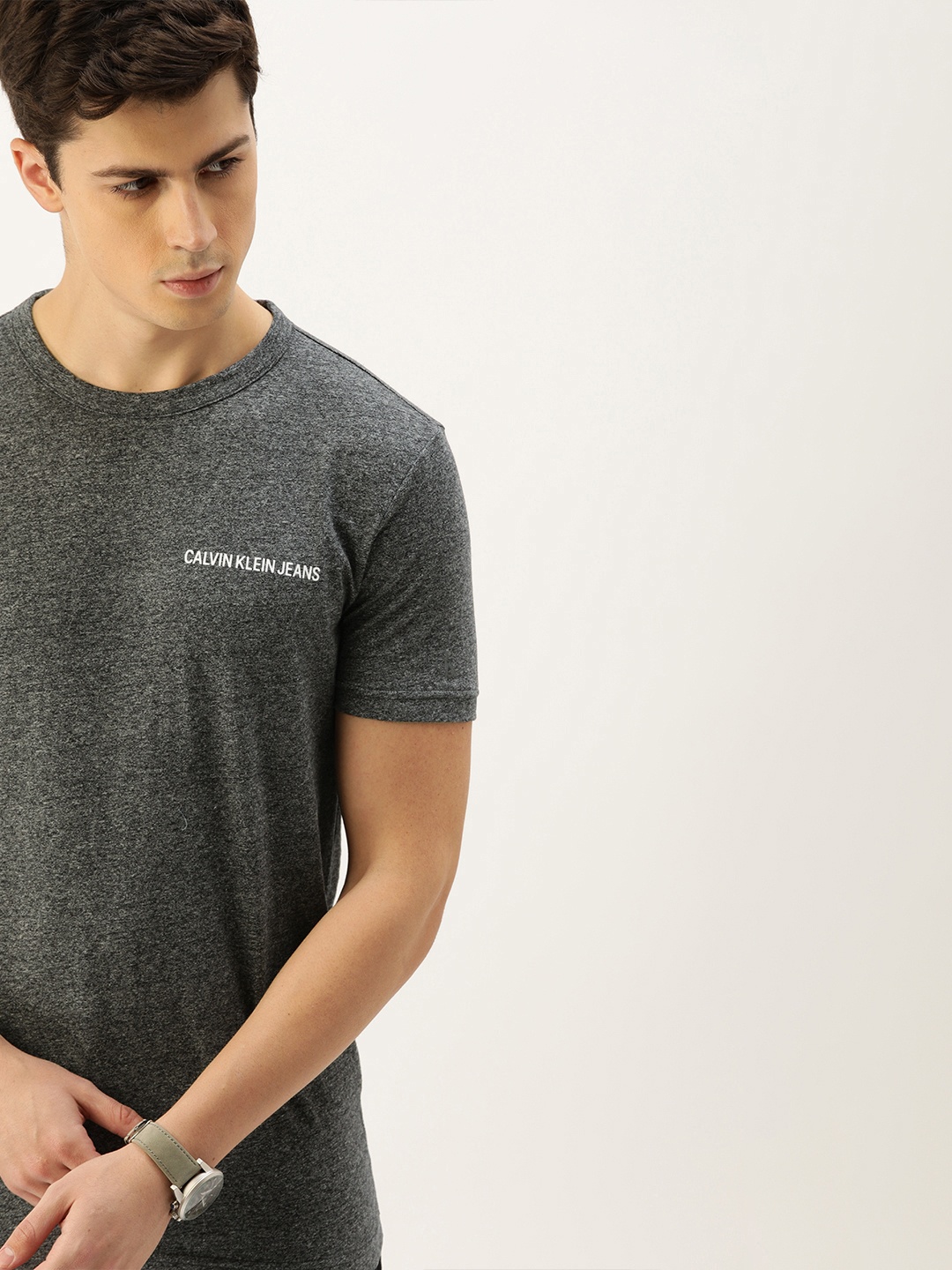 Calvin Klein Jeans Men Charcoal Grey Solid Round Neck Pure Cotton T-shirt with Printed Detail
Calvin Klein Jeans Men Charcoal Grey Solid Round Neck Pure Cotton T-shirt with Printed Detail