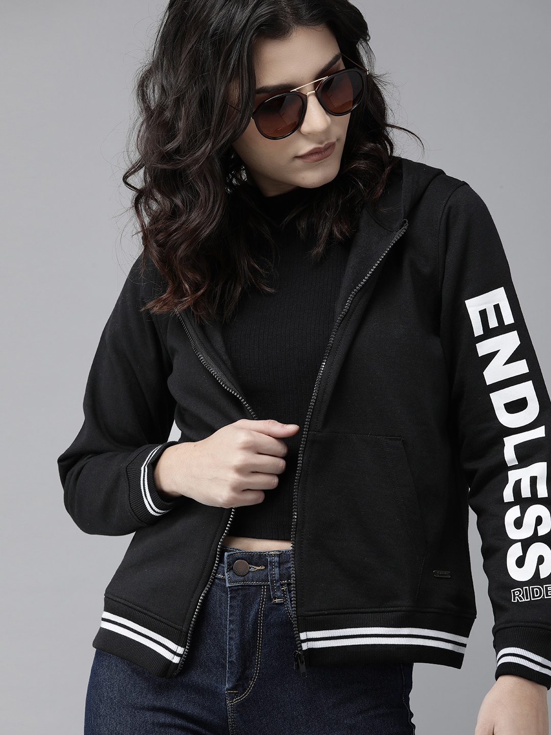 Roadster Women Black Typography Printed Front-Open Hooded Sweatshirt With Contrast Details
Roadster Women Black Typography Printed Front-Open Hooded Sweatshirt With Contrast Details