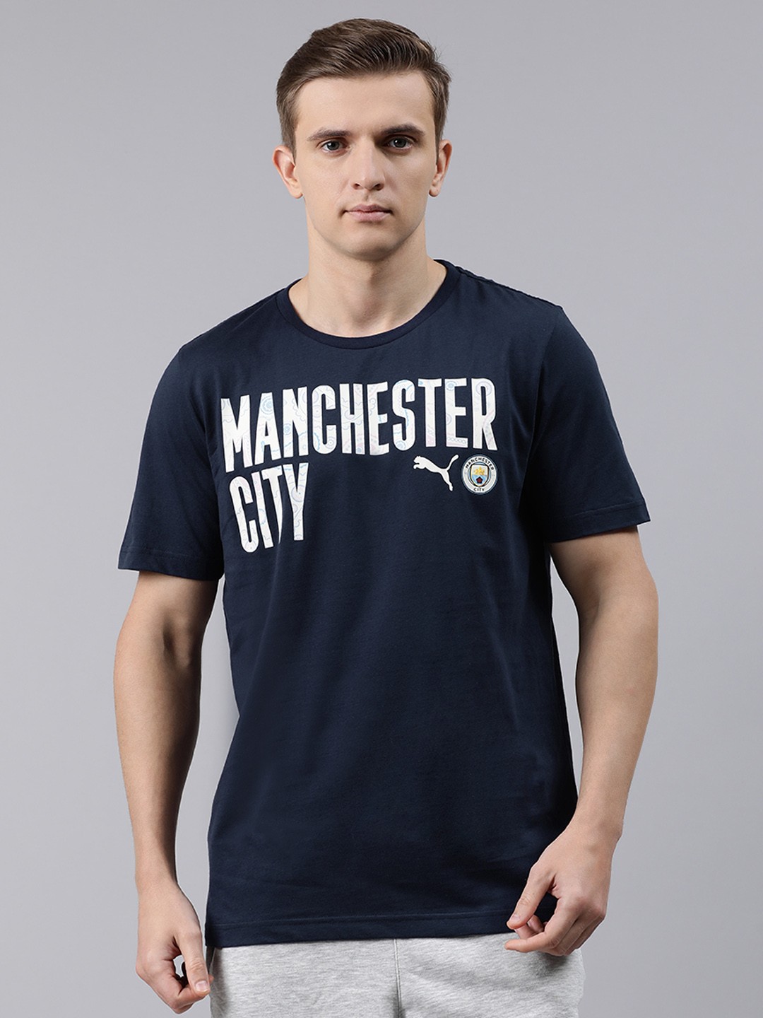 Puma Men Navy Blue Printed Round Neck MCFC ftblCore Wording Pure Cotton Football T-shirt
Puma Men Navy Blue Printed Round Neck MCFC ftblCore Wording Pure Cotton Football T-shirt