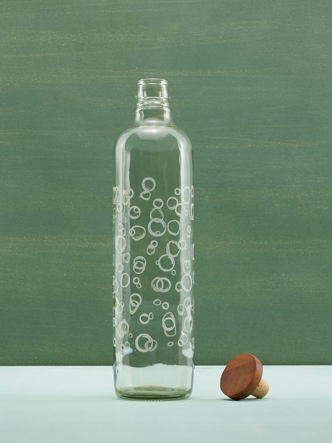 ellementry Unisex Transparent Solid Bubbles Glass Water Bottle With Wooden Stopper 750ml
ellementry Unisex Transparent Solid Bubbles Glass Water Bottle With Wooden Stopper 750ml