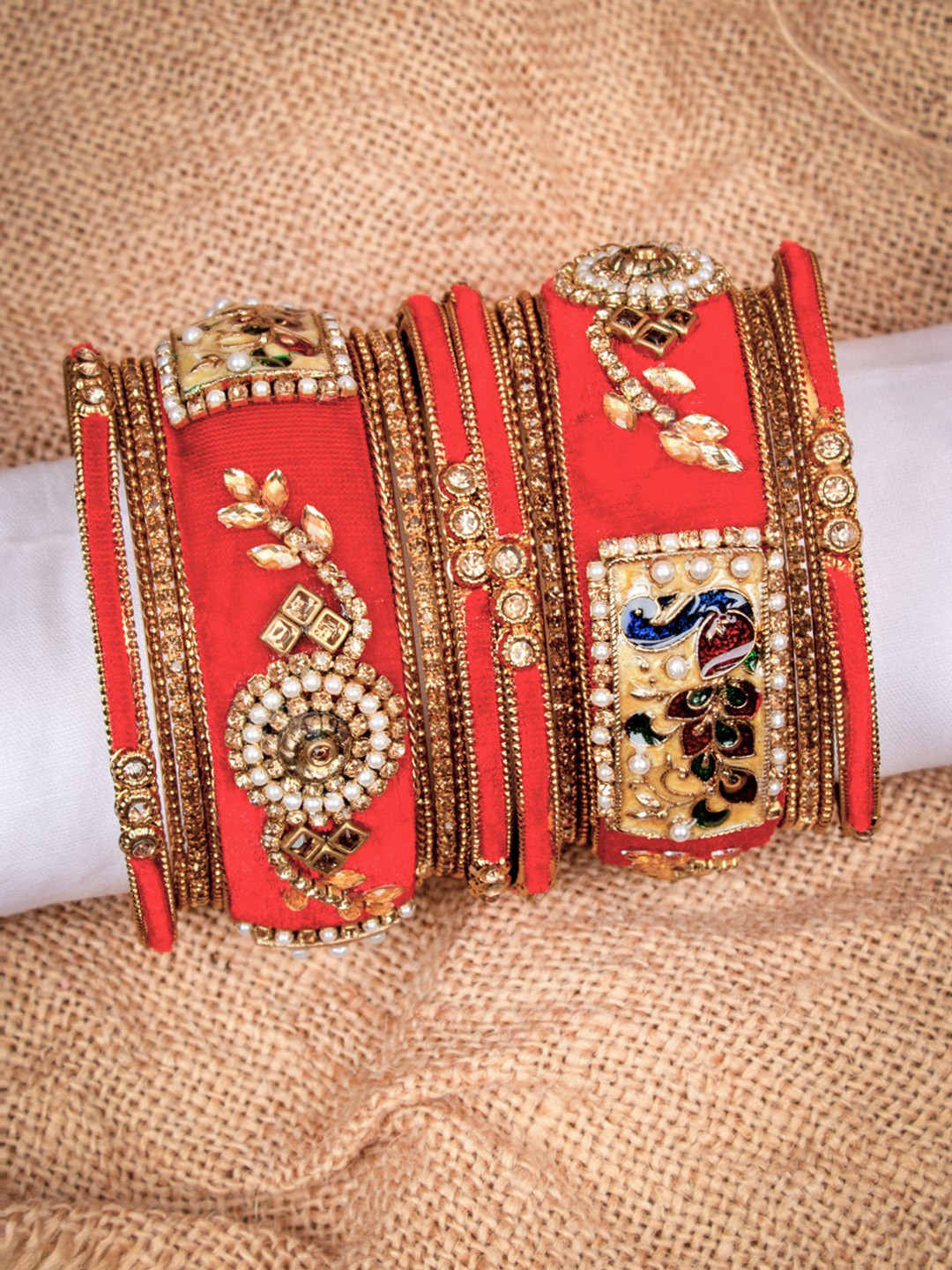 AccessHer Set of 18 Red & Gold-Toned Brass Plated Velvet Enamelled Handcrafted Bangles
AccessHer Set of 18 Red & Gold-Toned Brass Plated Velvet Enamelled Handcrafted Bangles