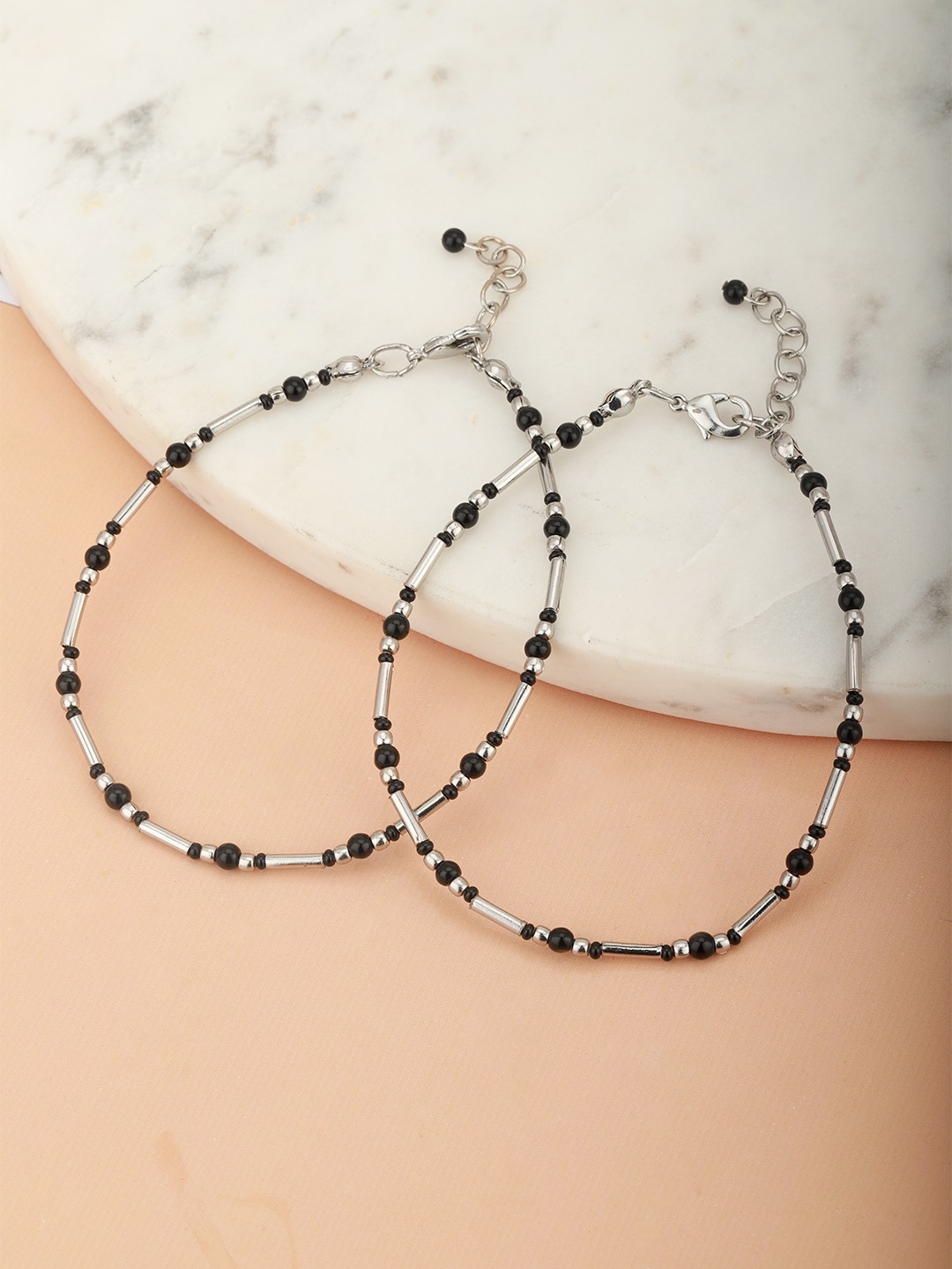 Carlton London Set of 2 Silver-Toned & Black Rhodium-Plated Beaded Handcrafted Anklets
Carlton London Set of 2 Silver-Toned & Black Rhodium-Plated Beaded Handcrafted Anklets