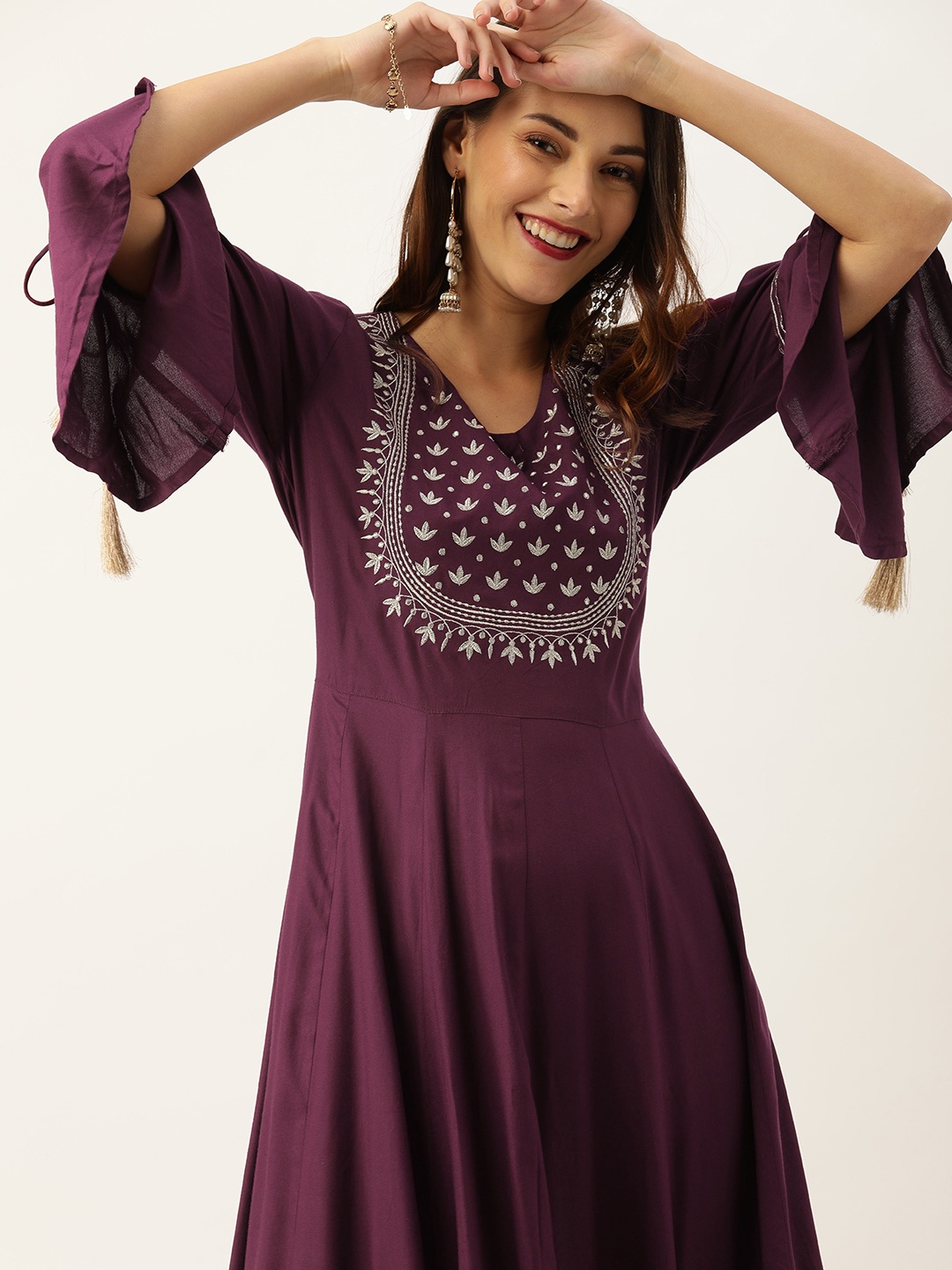 Varanga Women Burgundy & Silver Yoke Embroidered Bell Sleeves Zari Work Anarkali Kurta
Varanga Women Burgundy & Silver Yoke Embroidered Bell Sleeves Zari Work Anarkali Kurta