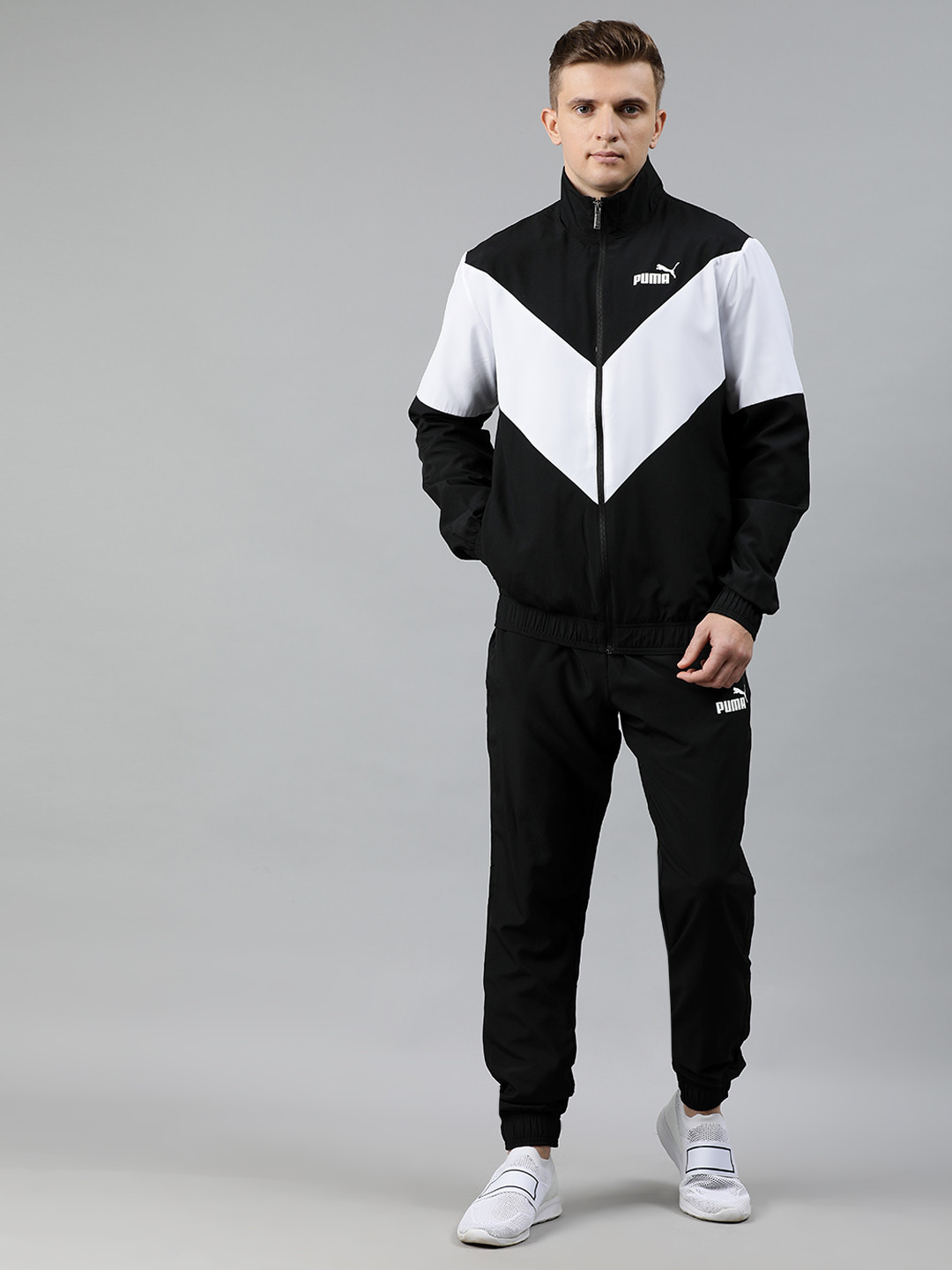 Puma Men Black & White Colourblocked Woven Tracksuit
Puma Men Black & White Colourblocked Woven Tracksuit