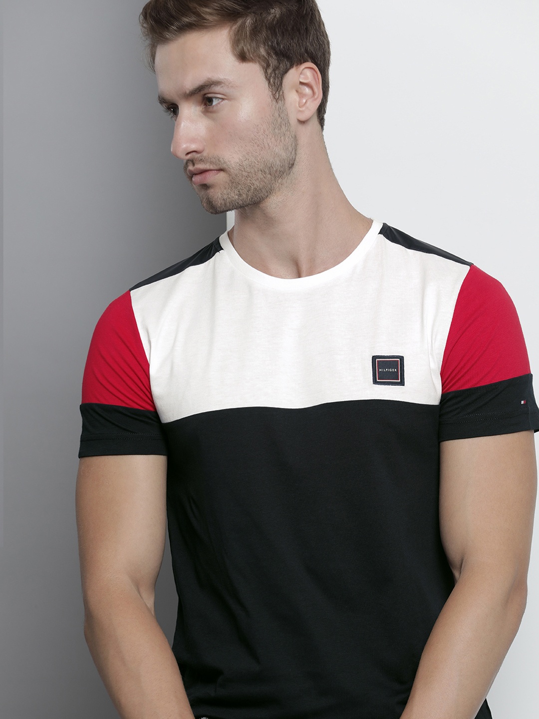 Tommy Hilfiger Men Navy Blue & White Colourblocked Pure Cotton Applique Slim Fit T-shirt
Tommy Hilfiger Men Navy Blue & White Colourblocked Pure Cotton Applique Slim Fit T-shirt