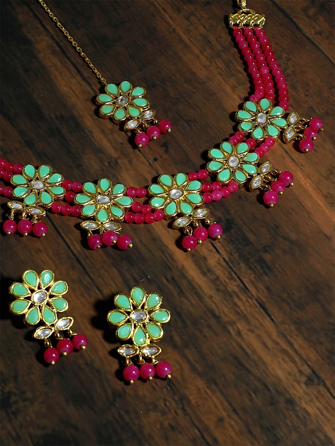 KARATCART Gold-Plated Pink & Sea-Green Kundan & Stone-Studded Beaded Handcrafted Jewellery Set
KARATCART Gold-Plated Pink & Sea-Green Kundan & Stone-Studded Beaded Handcrafted Jewellery Set