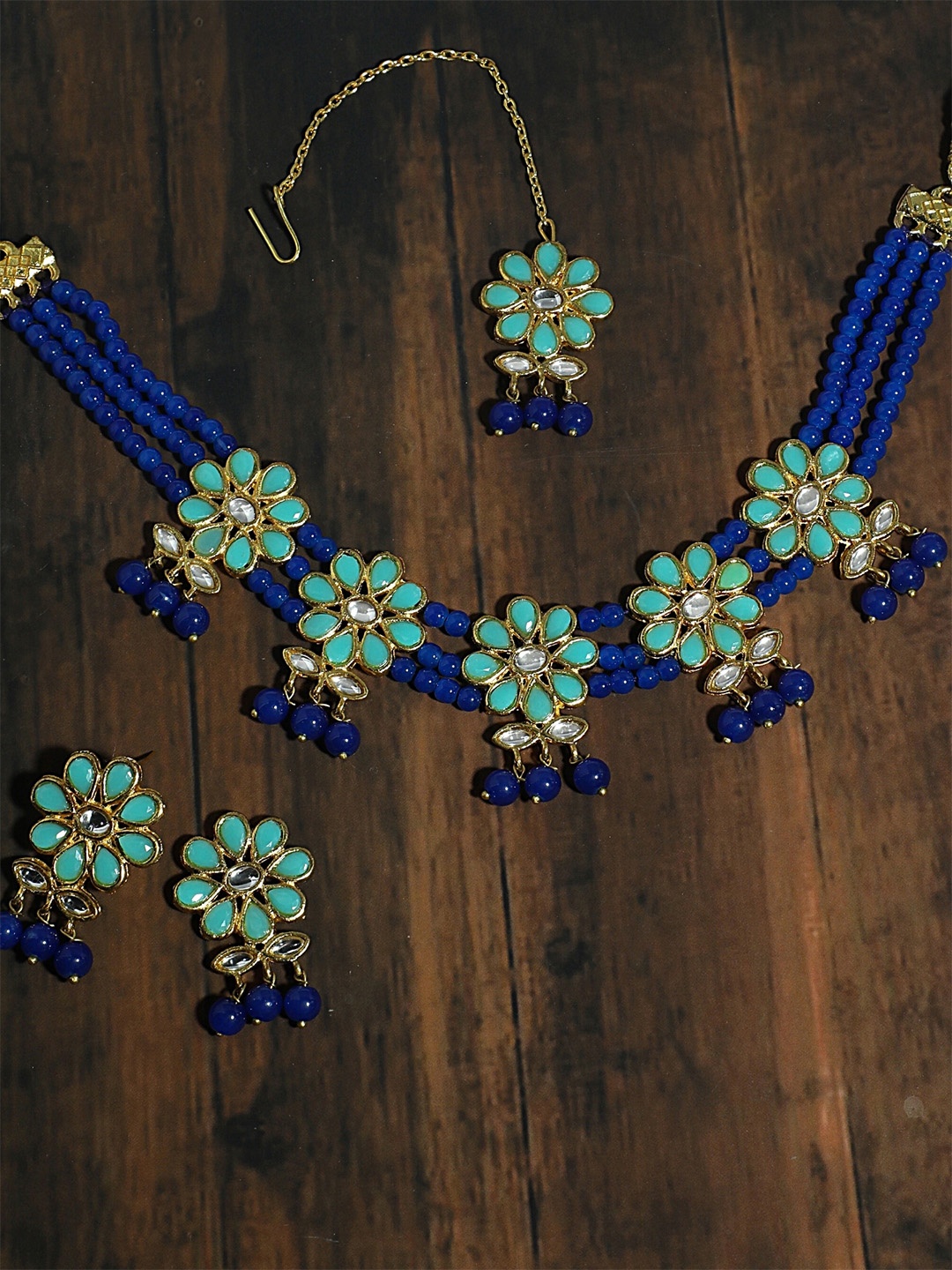 KARATCART Gold-Plated Blue & Sea-Green Kundan & Stone-Studded Beaded Handcrafted Jewellery Set
KARATCART Gold-Plated Blue & Sea-Green Kundan & Stone-Studded Beaded Handcrafted Jewellery Set