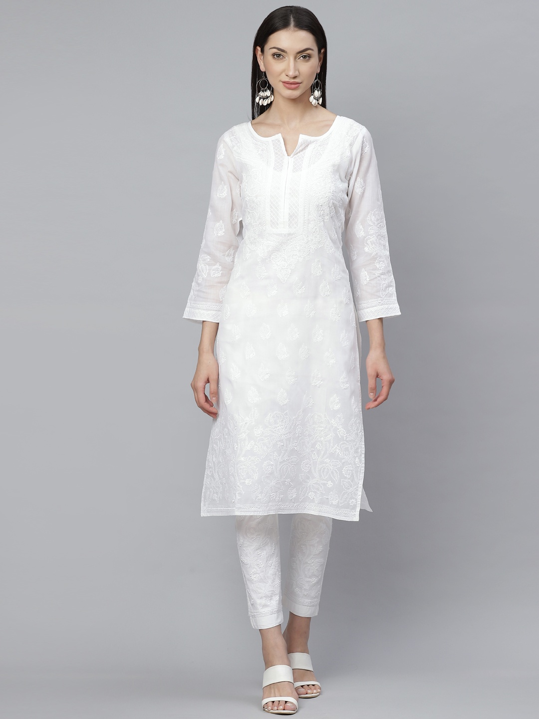 ADA Women White Chikankari Hand Embroidered Sustainable Handloom Kurta with Trousers
ADA Women White Chikankari Hand Embroidered Sustainable Handloom Kurta with Trousers