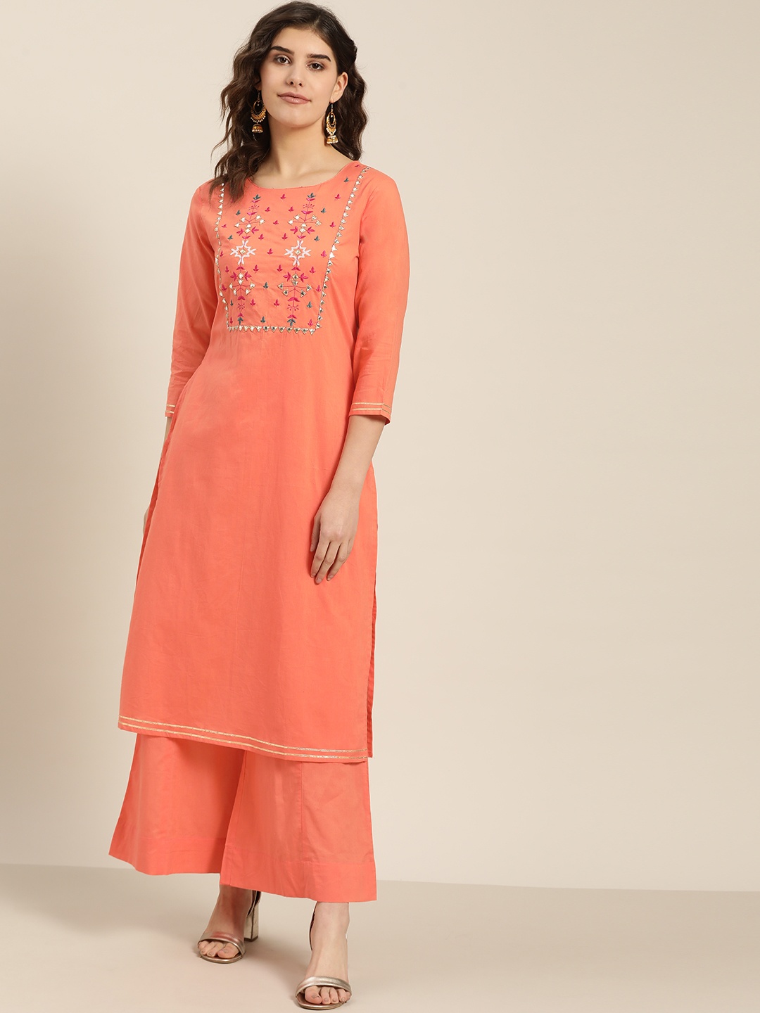 Sangria Women Peach-Coloured Yoke Embroidered Pure Cotton Straight Kurta with Palazzos
Sangria Women Peach-Coloured Yoke Embroidered Pure Cotton Straight Kurta with Palazzos