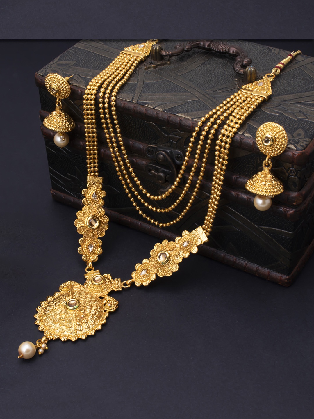 Sukkhi Gold-Plated Beige & White LCT Stone-Studded Pearl Embellished Antique Jewellery Set
Sukkhi Gold-Plated Beige & White LCT Stone-Studded Pearl Embellished Antique Jewellery Set