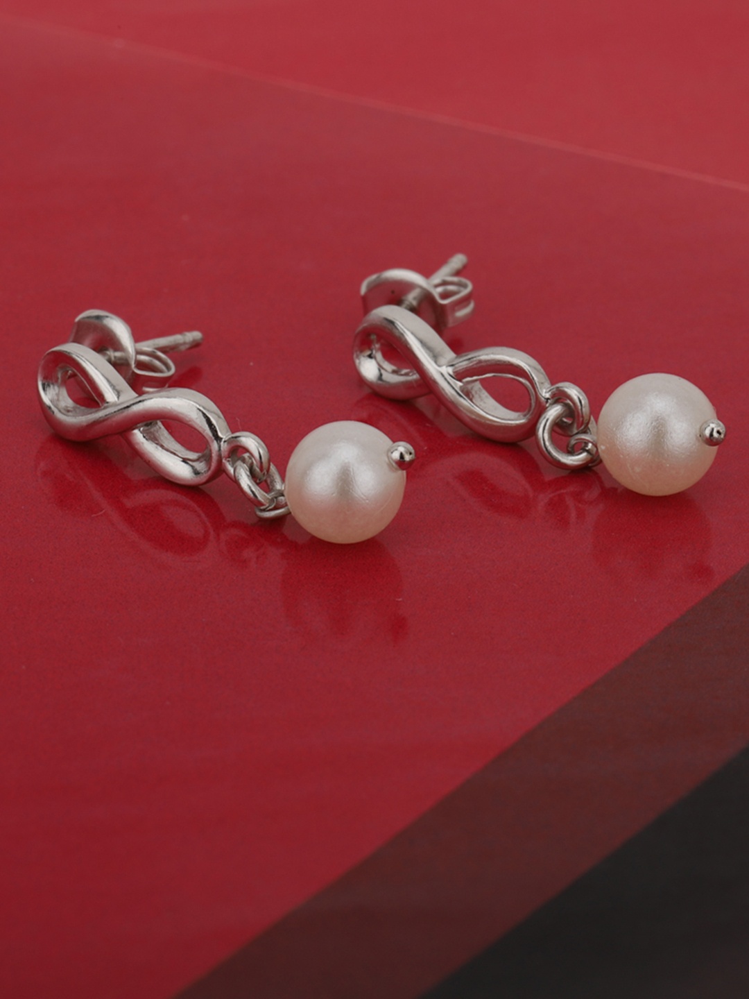Carlton London Silver-Toned & White Rhodium-Plated Beaded Infinity Shaped Drop Earrings
Carlton London Silver-Toned & White Rhodium-Plated Beaded Infinity Shaped Drop Earrings
