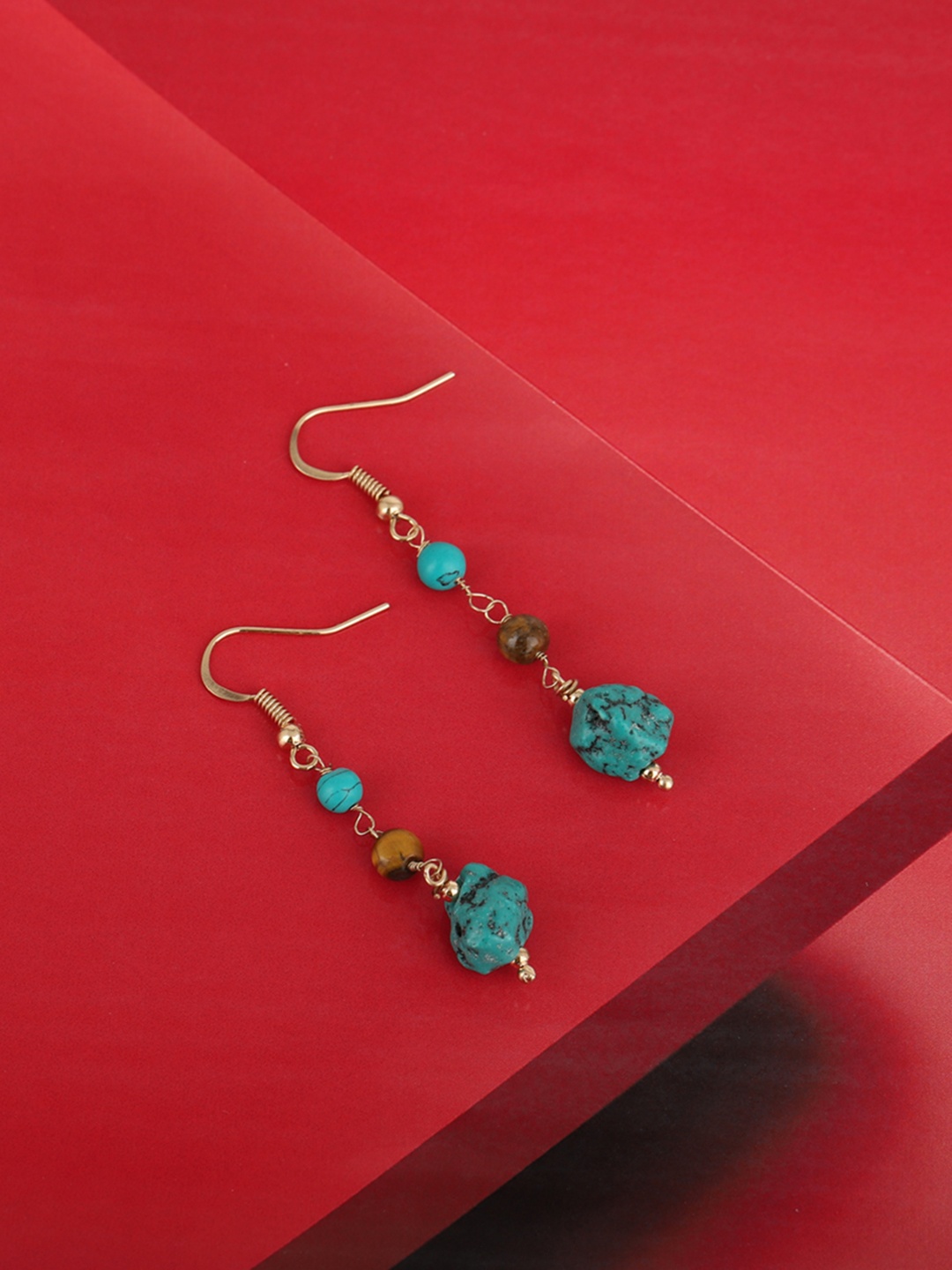 Carlton London Blue & Brown Gold-Plated Stone Studded & Beaded Contemporary Drop Earrings
Carlton London Blue & Brown Gold-Plated Stone Studded & Beaded Contemporary Drop Earrings
