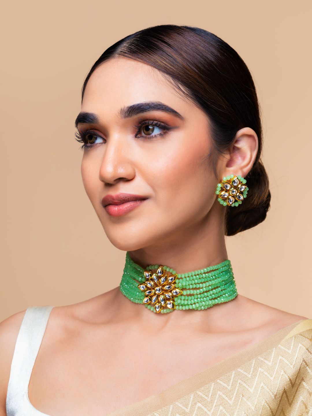 Priyaasi Mint Green Gold-Plated Kundan Studded & Beaded Handcrafted Choker Jewellery Set
Priyaasi Mint Green Gold-Plated Kundan Studded & Beaded Handcrafted Choker Jewellery Set