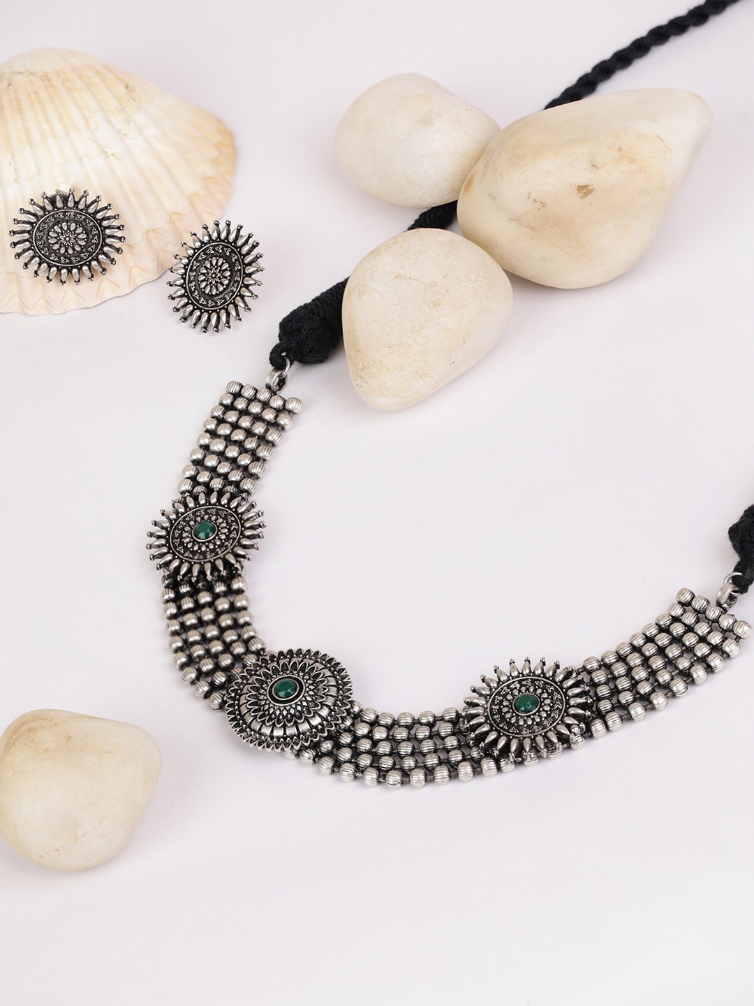 Priyaasi Green Oxidised Silver-Plated German Silver Emerald-Studded Jewellery Set
Priyaasi Green Oxidised Silver-Plated German Silver Emerald-Studded Jewellery Set