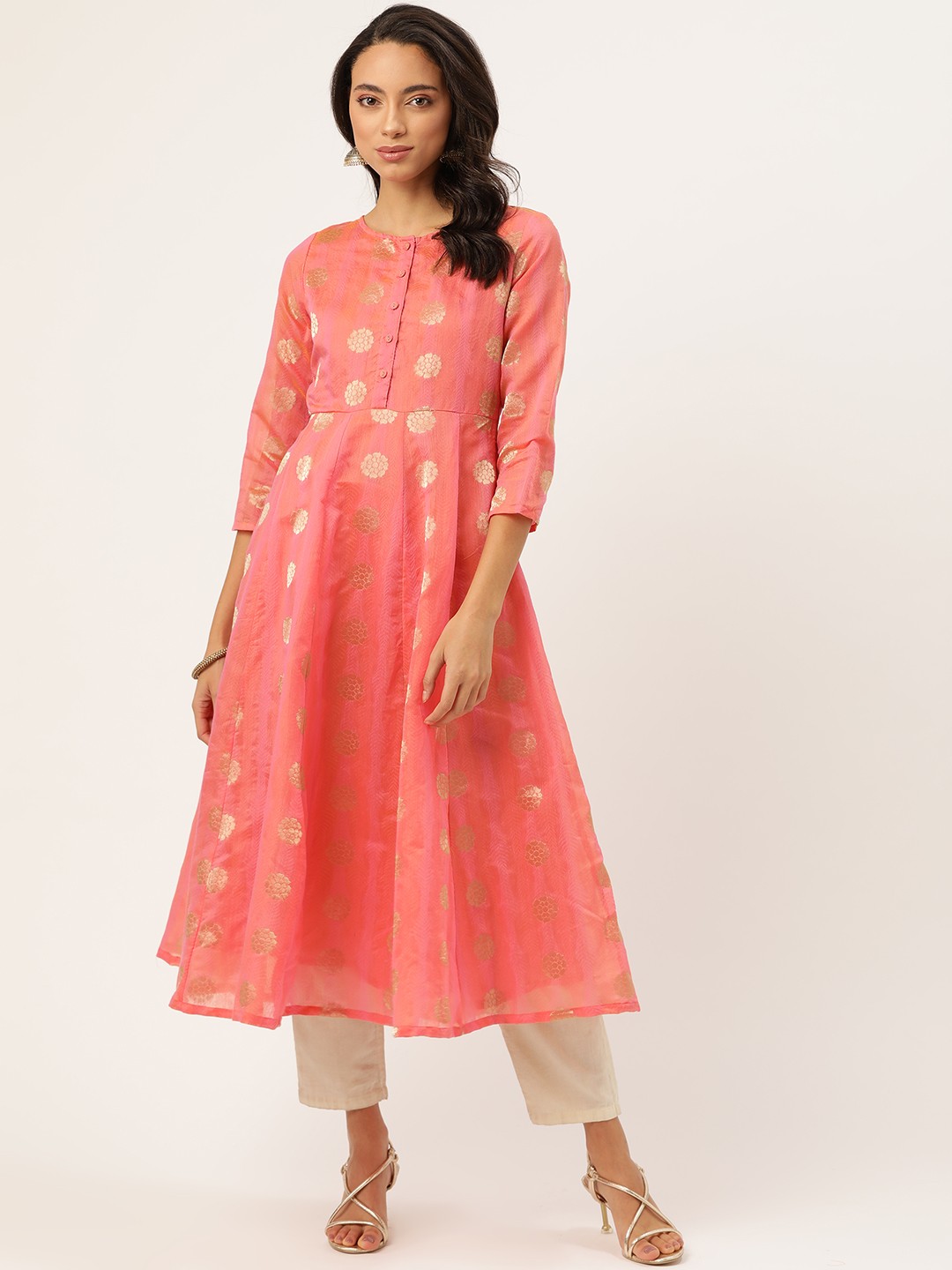 Shae by SASSAFRAS Women Coral Pink & Golden Dual-Toned Jacquard Design Anarkali Kurta
Shae by SASSAFRAS Women Coral Pink & Golden Dual-Toned Jacquard Design Anarkali Kurta