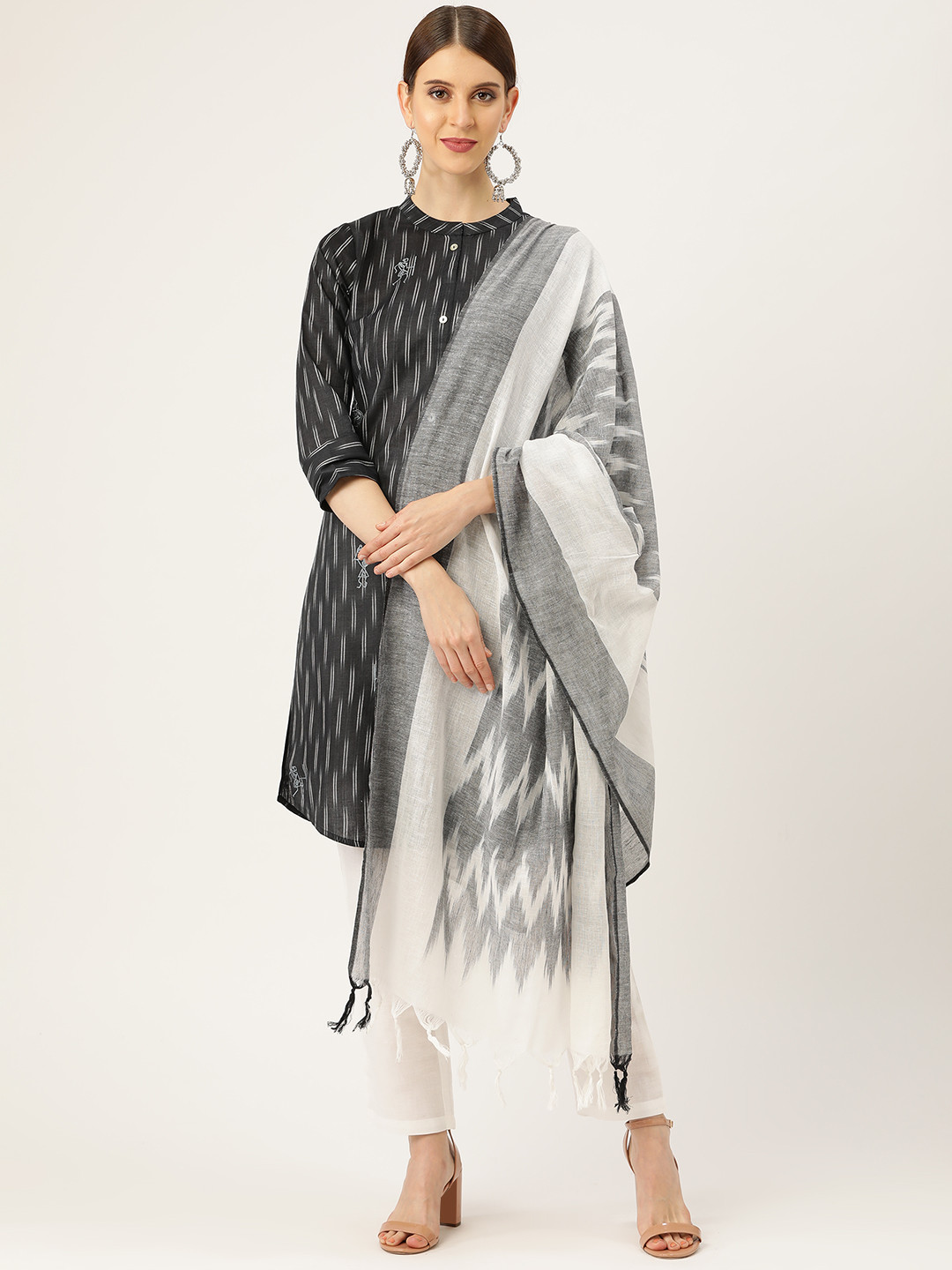 Prakrti Women Black & White Pochampally Ikat Printed Sustainable Kurta with Trousers & Dupatta
Prakrti Women Black & White Pochampally Ikat Printed Sustainable Kurta with Trousers & Dupatta