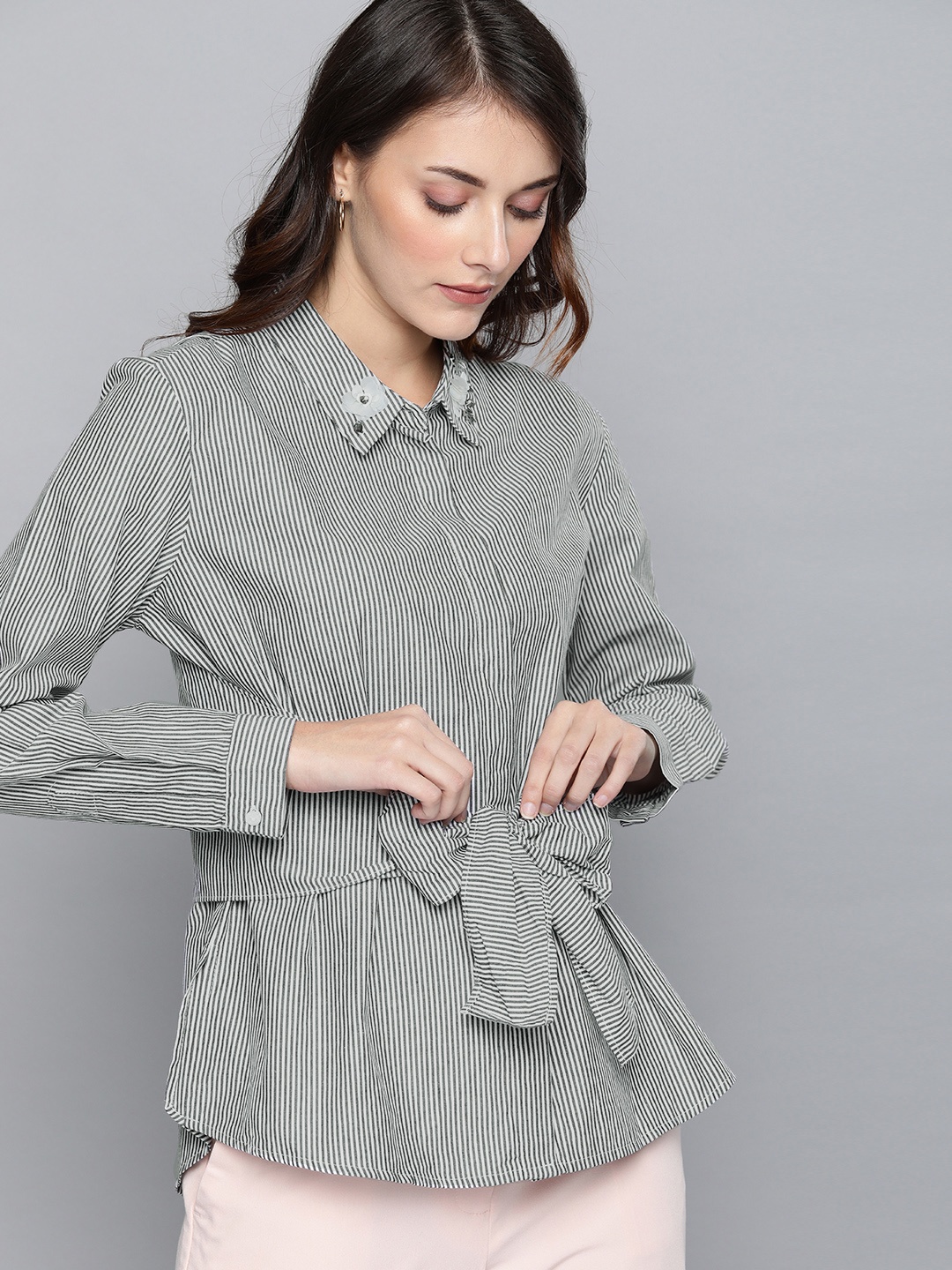 Chemistry Women Black & White Striped Shirt Style Pure Cotton Top with Waist Tie-Ups
Chemistry Women Black & White Striped Shirt Style Pure Cotton Top with Waist Tie-Ups