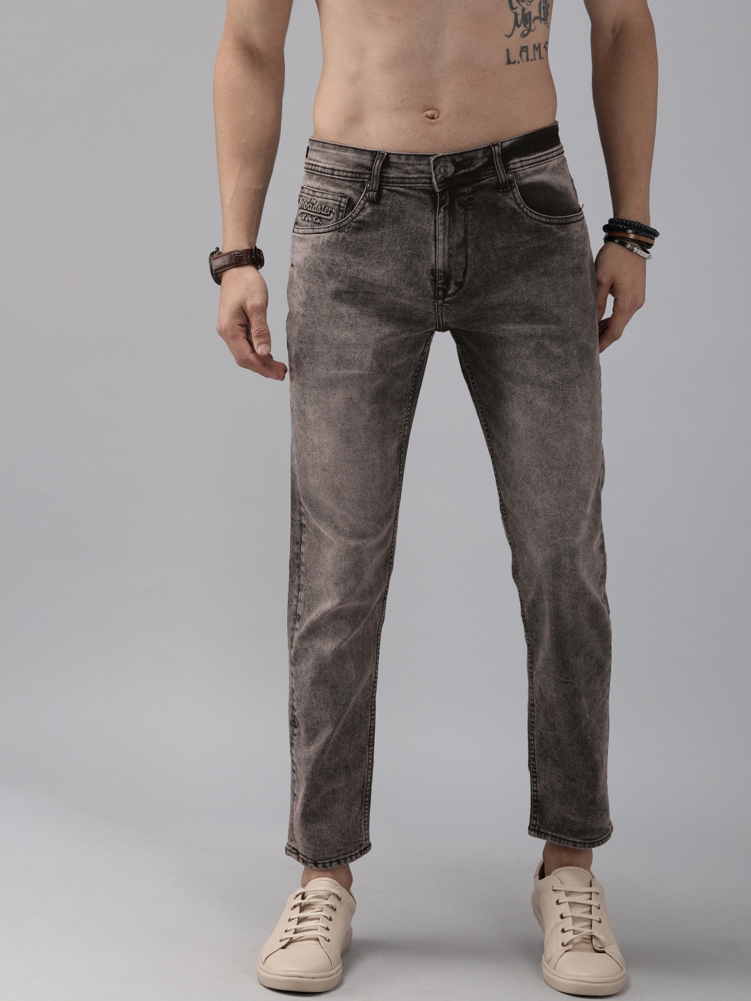 The Roadster Lifestyle Co Men Black Tapered Fit Mid-Rise Clean Look Stretchable Jeans
The Roadster Lifestyle Co Men Black Tapered Fit Mid-Rise Clean Look Stretchable Jeans